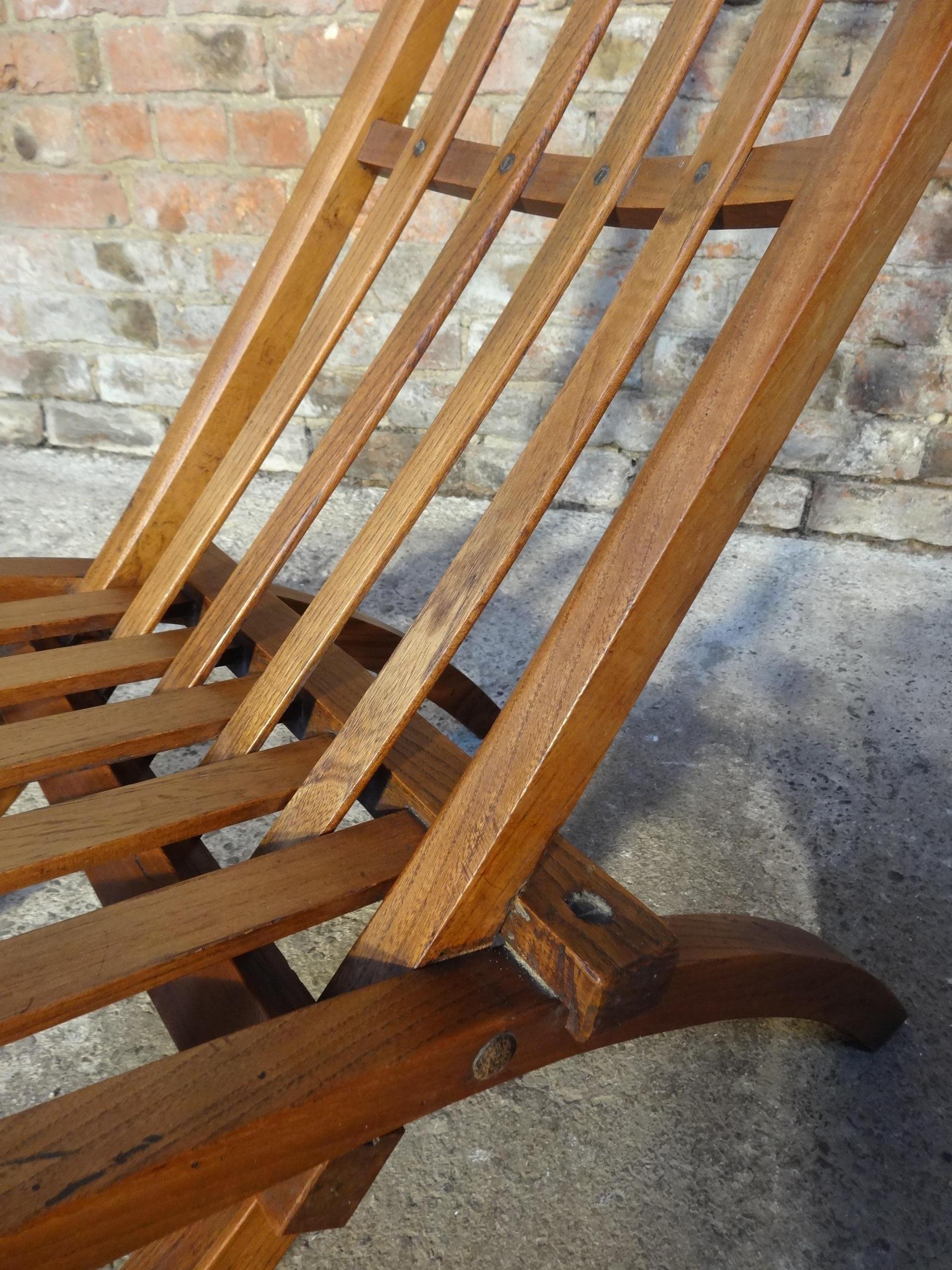 sculptural antique circa 1890 Victorian English solid wooden oak folding chair

Stunning chair in mint condition! 

Measures: Seat height 35cm, back height 88cm, depth 75cm, witdh 49cm.