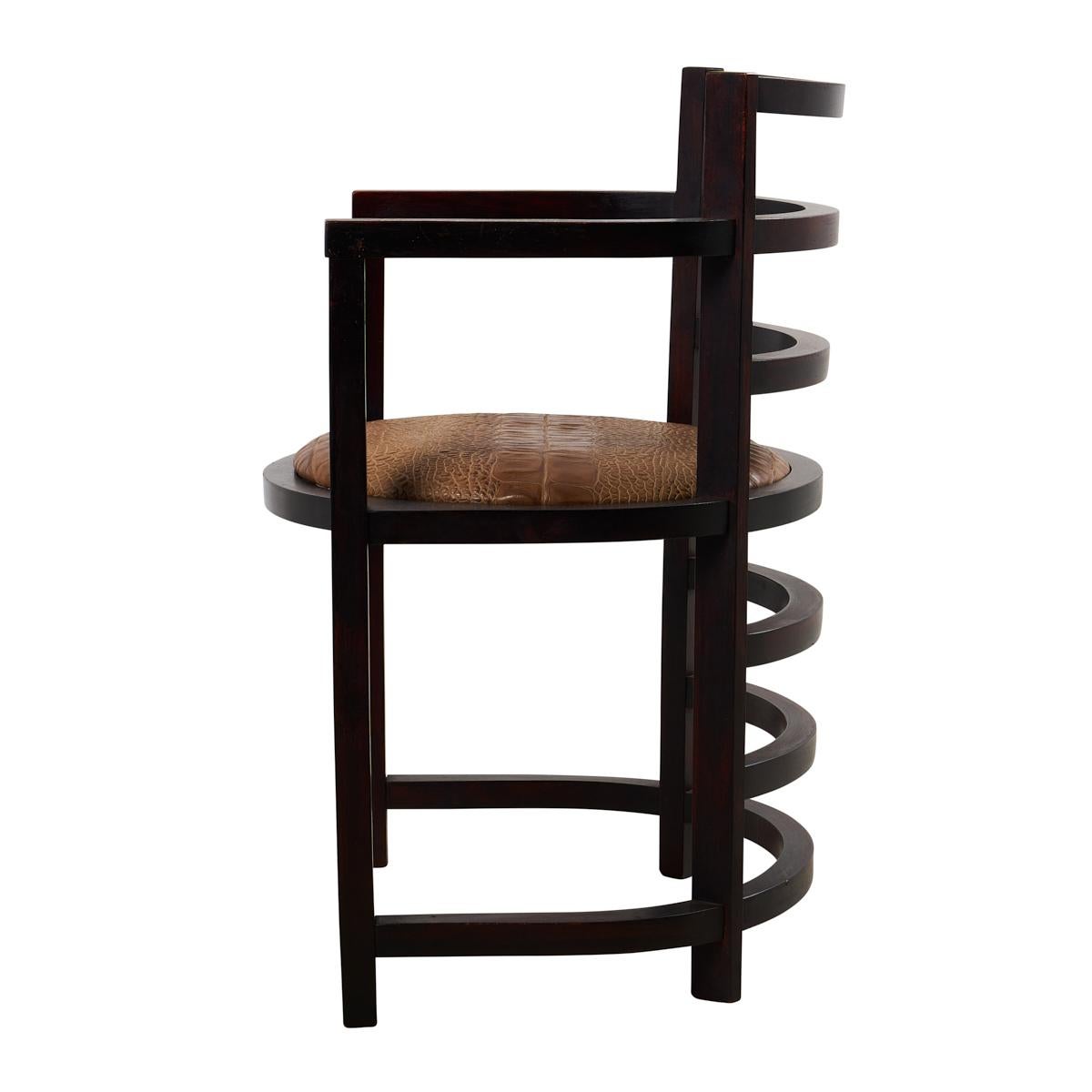 With its handsome, curvilinear frame and upholstered seat, this sculptural armchair evokes Josef Hoffman’s turn-of-the-century bentwood designs for the Cafe Fledermaus in Vienna. The ideal desk or pull-up chair, it makes a stylish, architectural