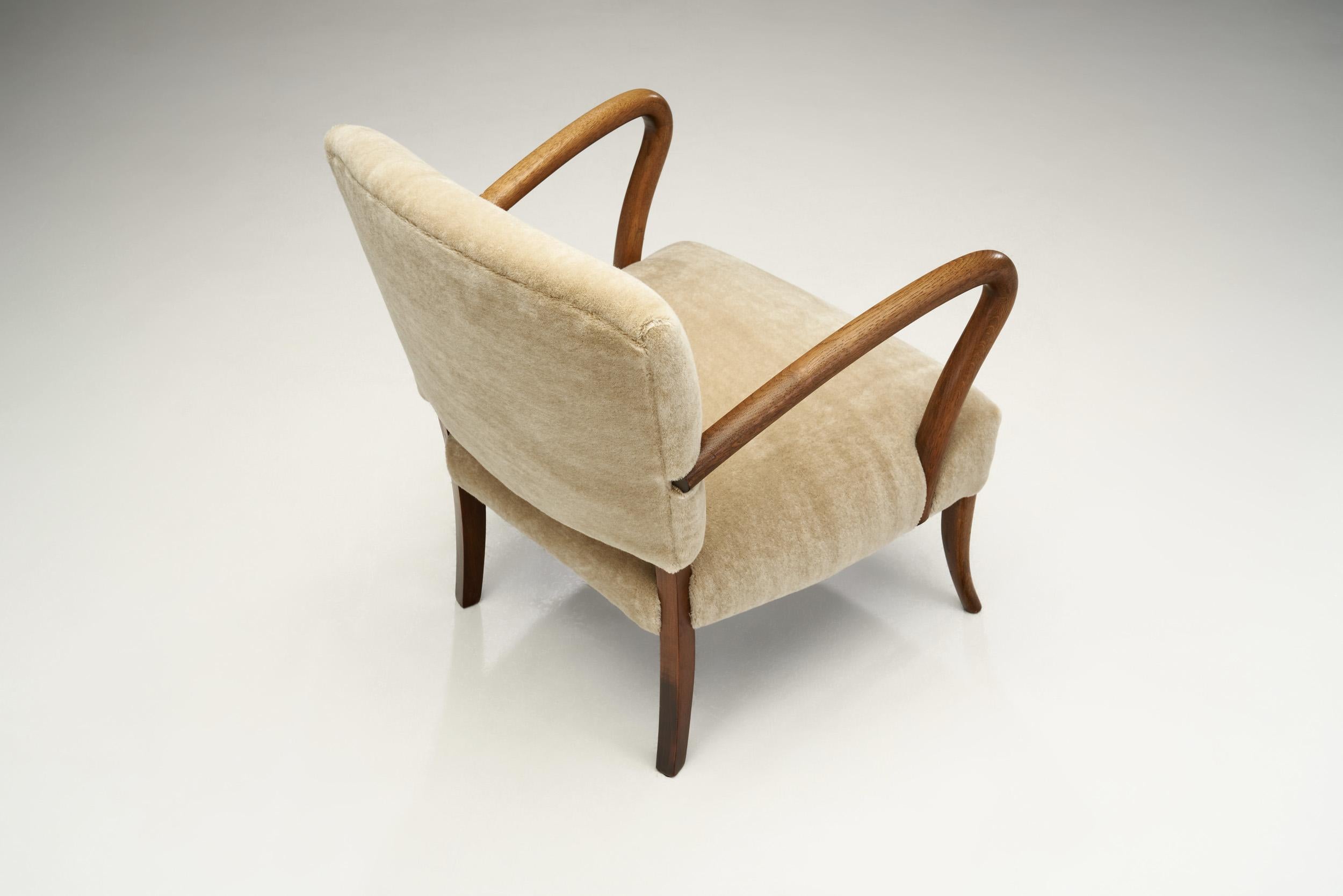 Mid-20th Century Sculptural Armchair with Curved Arms, Europe ca 1950s For Sale