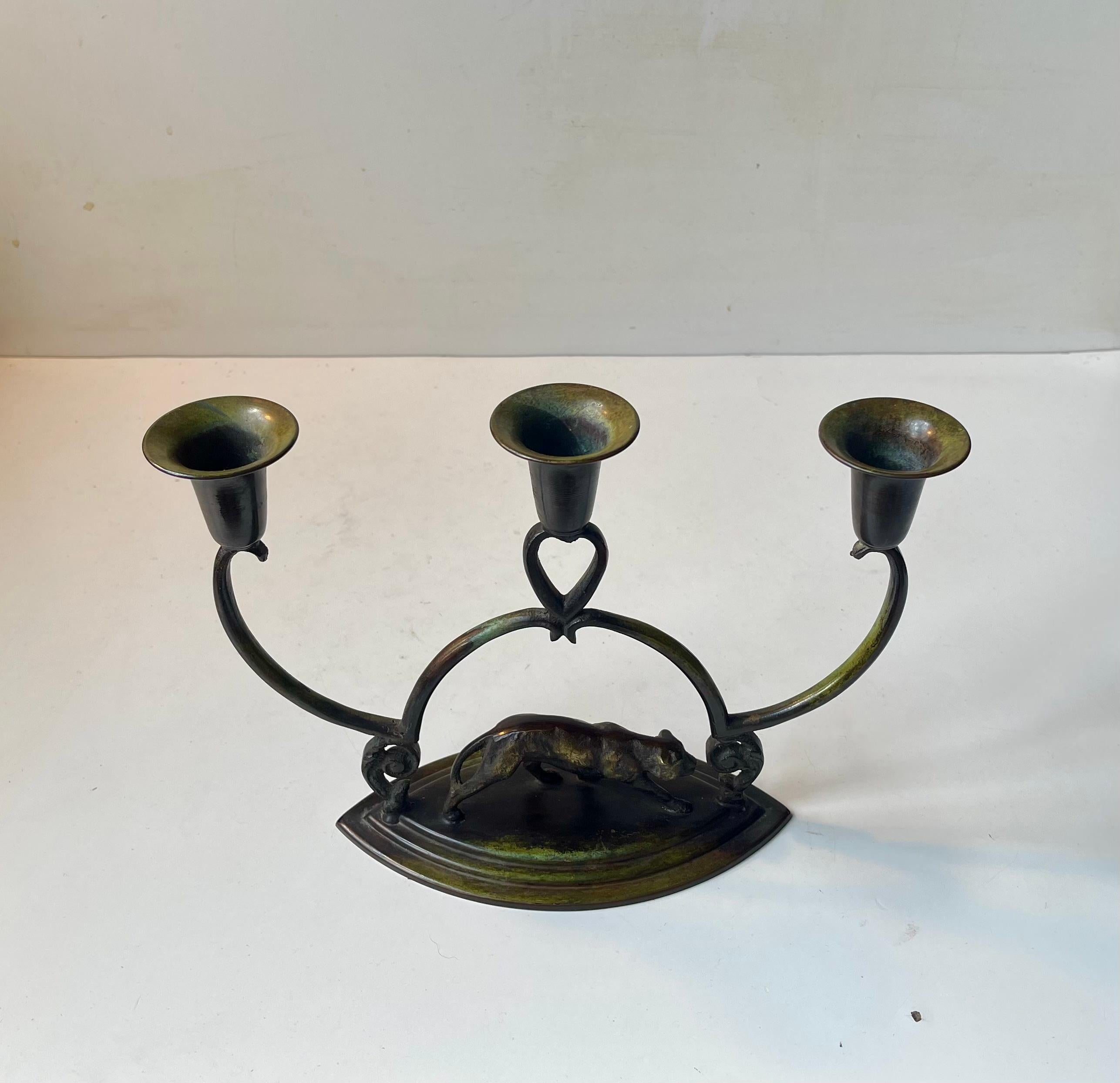 Mid-20th Century Sculptural Art Deco Panther Candelabra in Patinated Bronze, 1930s