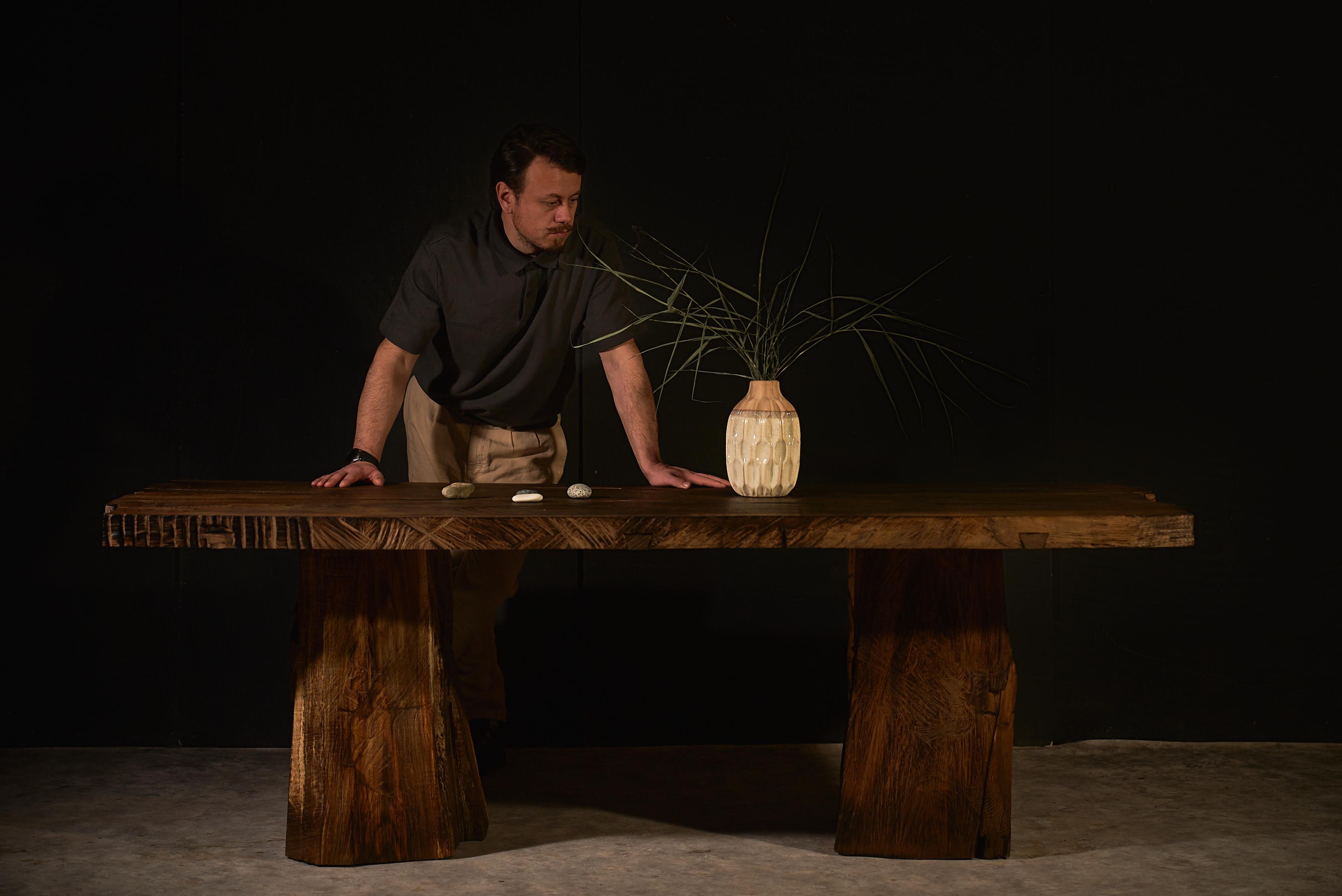 This dining table is an original work by Sergio Vulpe, born on the periphery of the former Soviet Union. A difficult childhood in that environment left its mark — not just in memory, but in a way of seeing and feeling the world. It shaped a