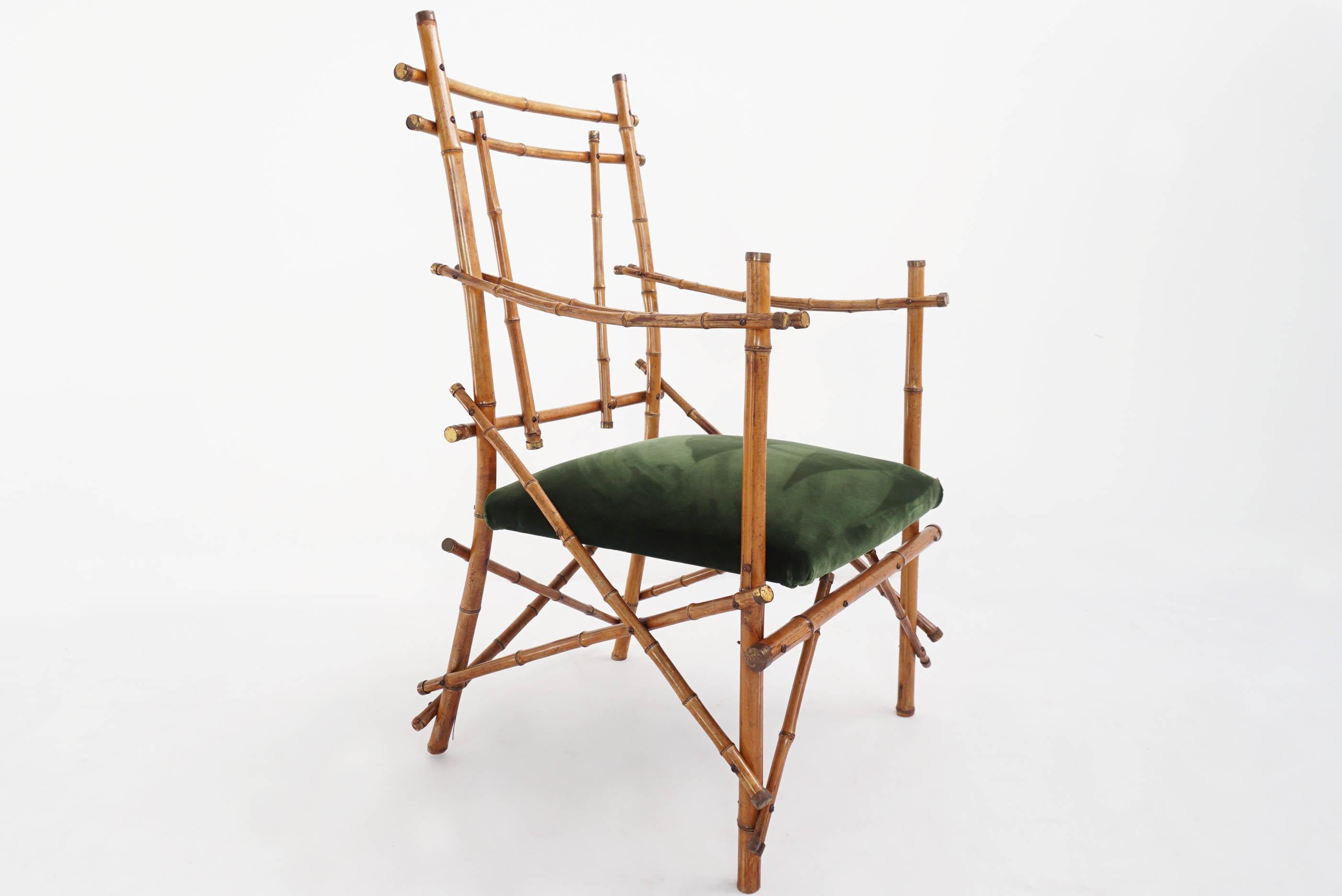 Stunning and impressive armchairs in bamboo, late 1960, made in Italy.
The same model it is in the Gabriella Crespi Milano private apartment.

New seating cover in first class green forest velvet, brass details on the end of the bamboo.
            