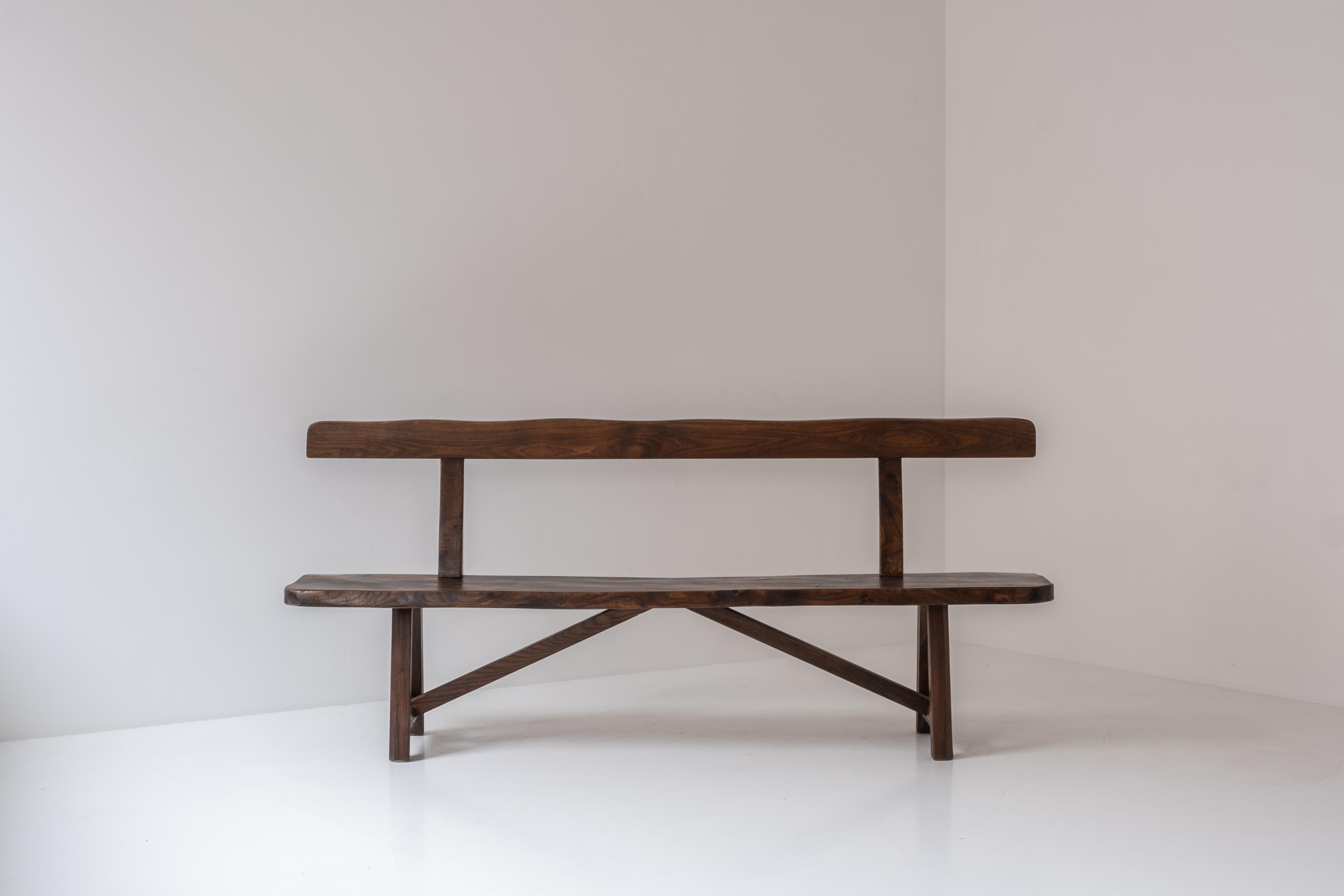 Sculptural bench by Olavi Hanninen for Mikko Nupponen, Finland 1950’s. This bench is made of stained elm wood and sculpturally crafted by hand. Presented in a good, restored, condition.

We can pack and ship worldwide !