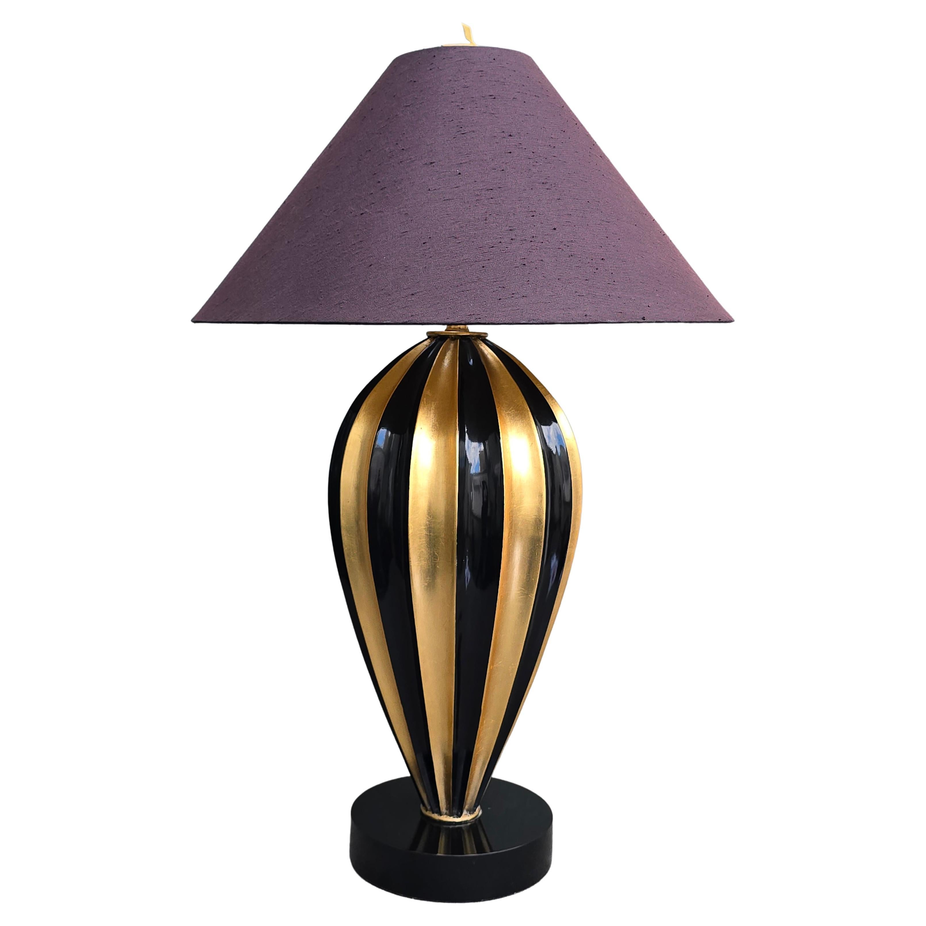Sculptural Black and Gold Table Lamp by Leeazanne for Lam Lee Group, USA, circa 1990

A striking, sculptural table lamp designed by Leeazanne for Lam Lee Group, handmade in the United States circa 1990. This dramatic piece features a striking,