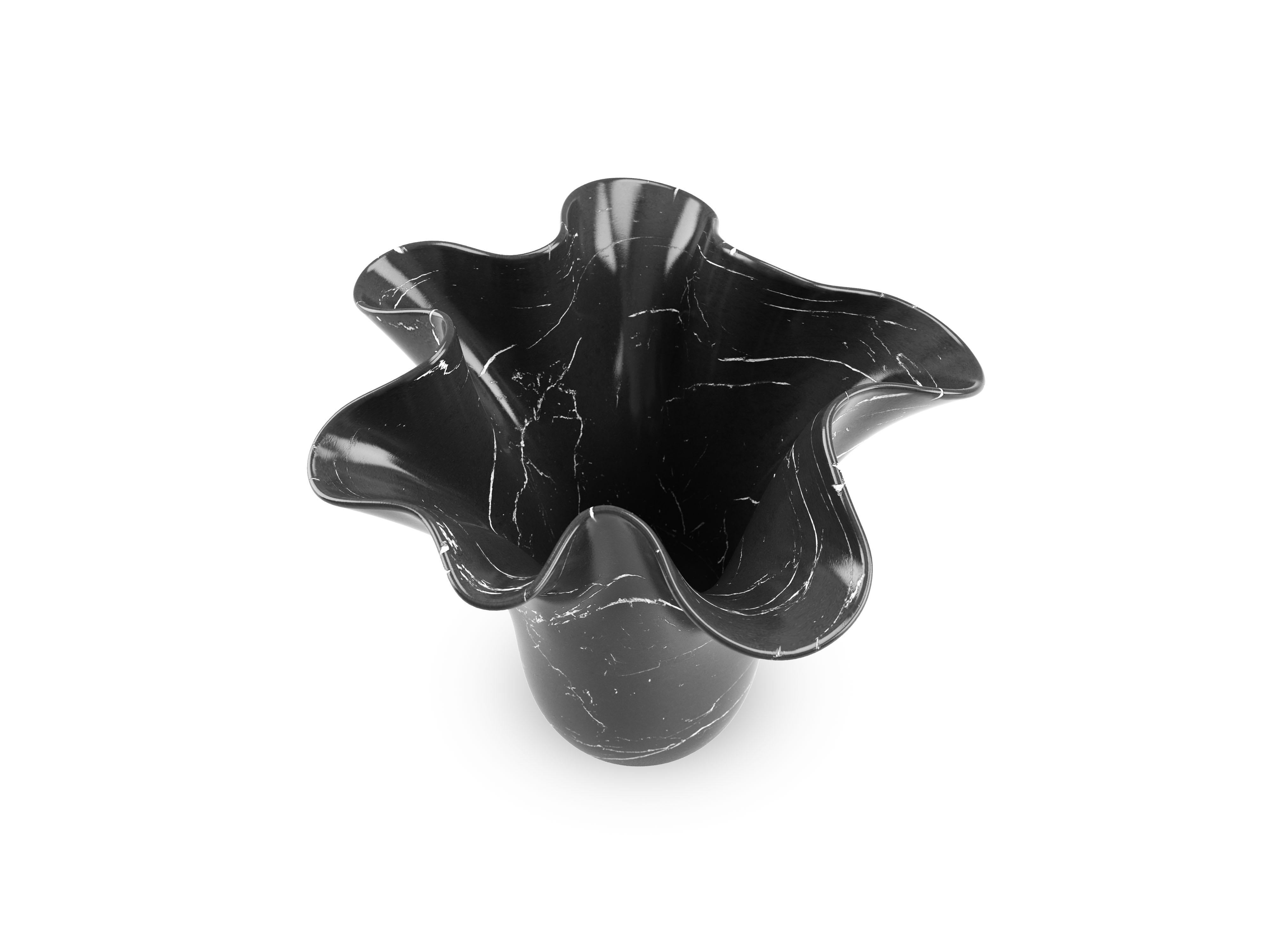 Sculptural vase carved by hand from a solid block of Marquina marble, polished finish. This vase reproduces, in a smaller version, the iconic sculptural vase PV05 designed by the Atelier Barberini & Gunnell, hand made in a limited edition for the