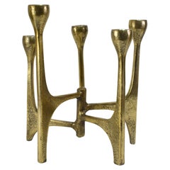 Candelabro scultoreo in ottone