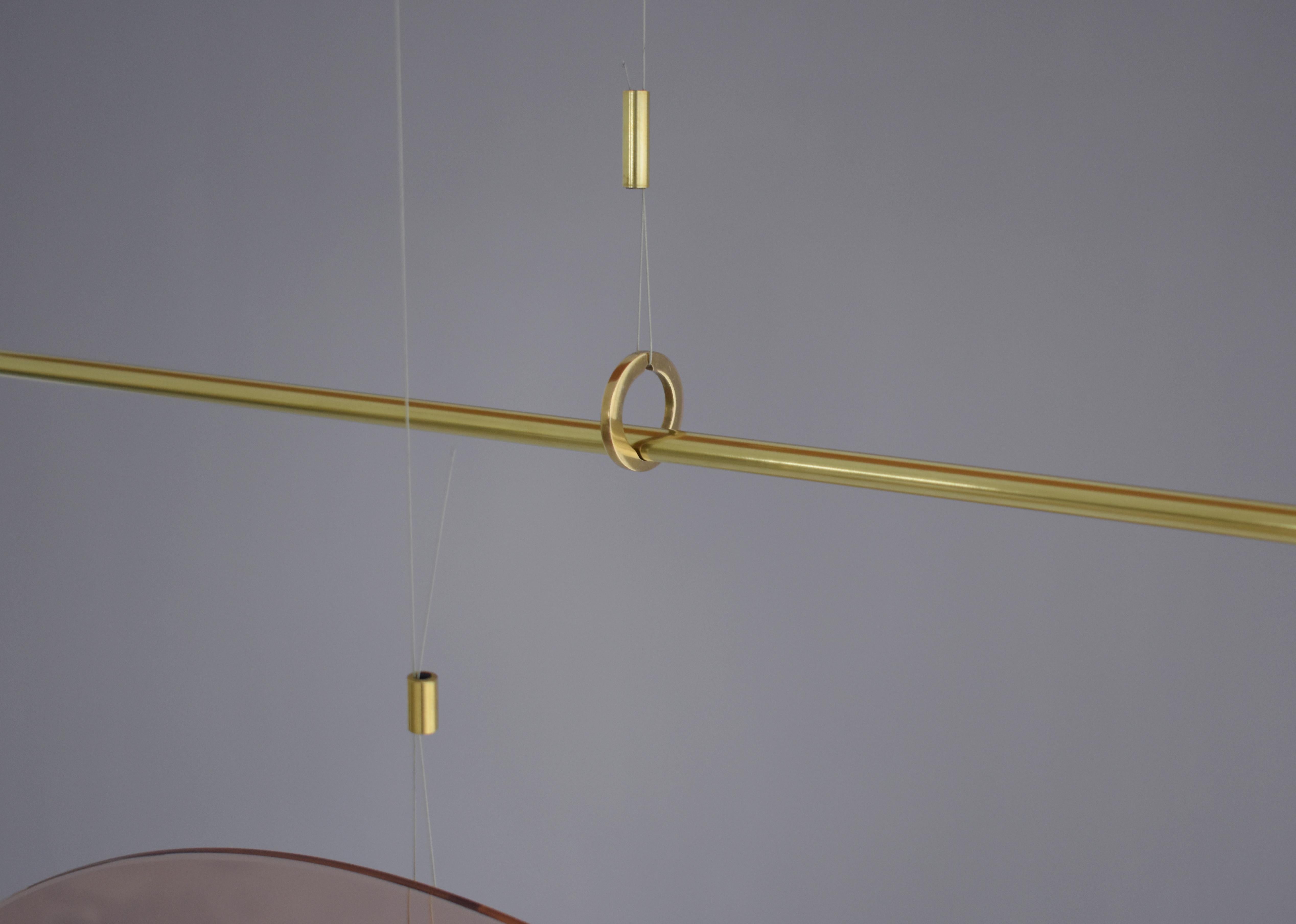 Sculptural brass light pendant - Equilibrum by Periclis Frementitis

Bulb specifications
120 - 240V
G4 LED / 5W / 12V / 400lm / 3000K
Product specifications
Input voltage: 120V - 240V
Maximum wattage: 15W
Maximum Lm: 1200 lm
Product weight: