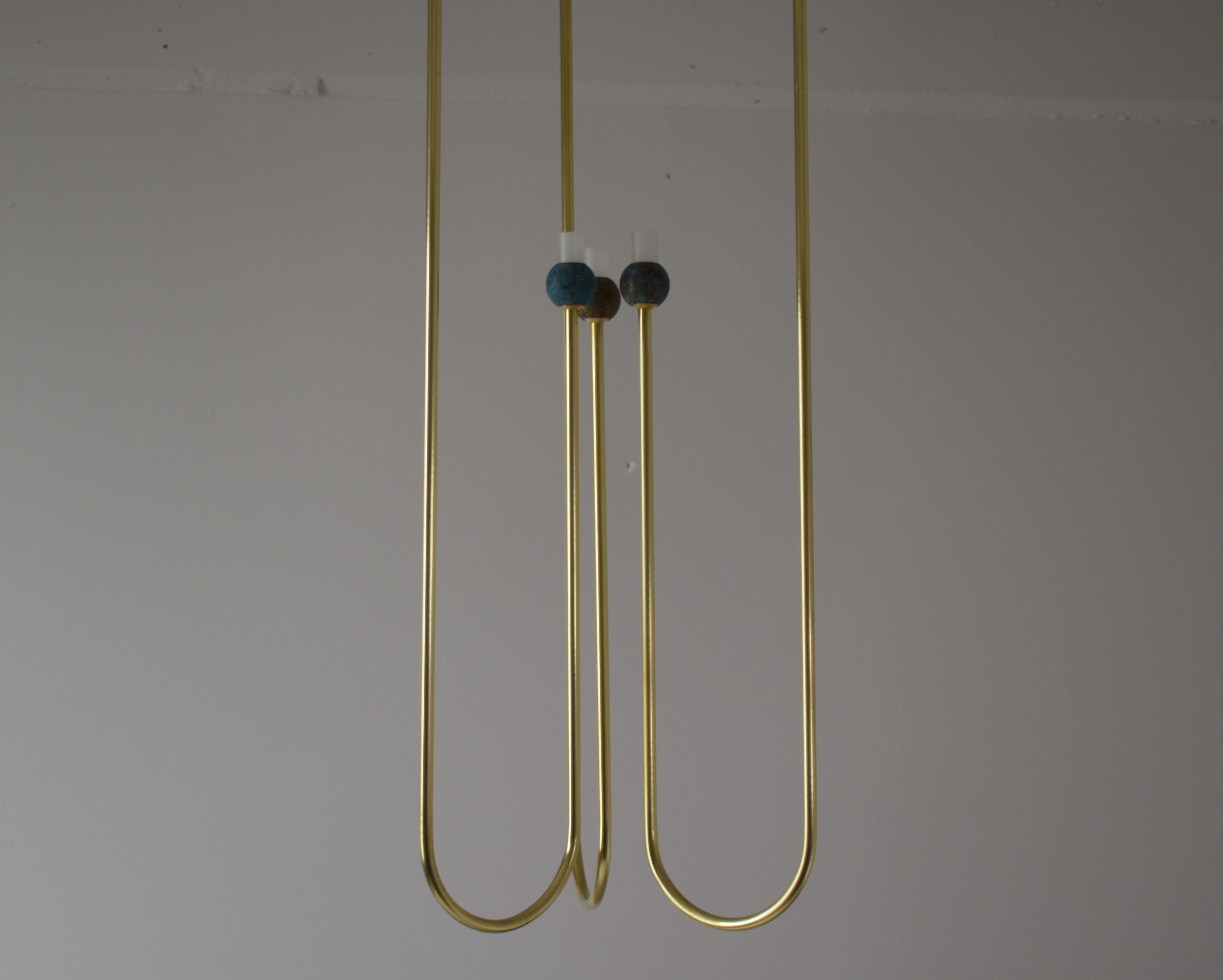 Brass sculpted light suspension, 