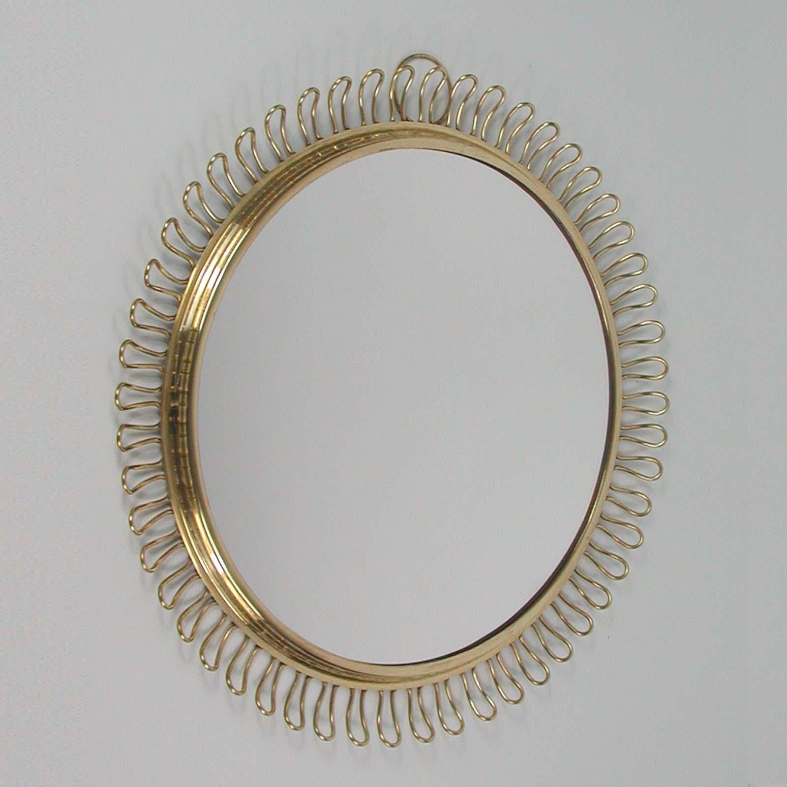 Mid-Century Modern Sculptural Brass round Wall Mirror by Josef Frank Svenskt Tenn, Sweden, 1950s