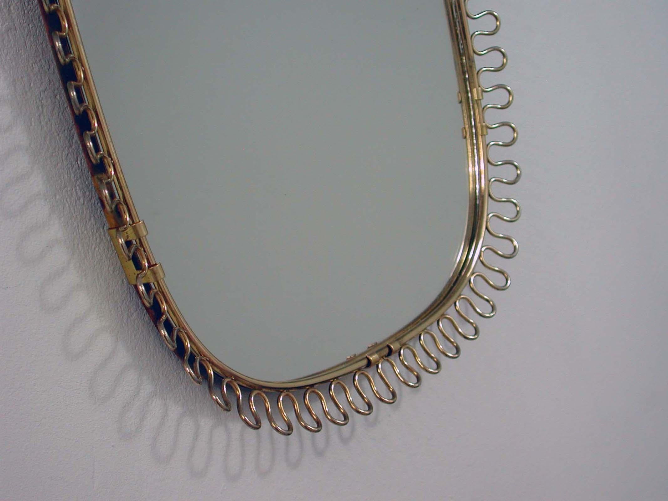 Mid-Century Modern Sculptural Brass Wall Mirror by Josef Frank for Svenskt Tenn, 1950s