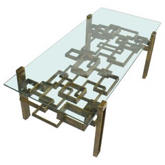 Mesa de centro escultórica de bronce con tapa de cristal Años 70