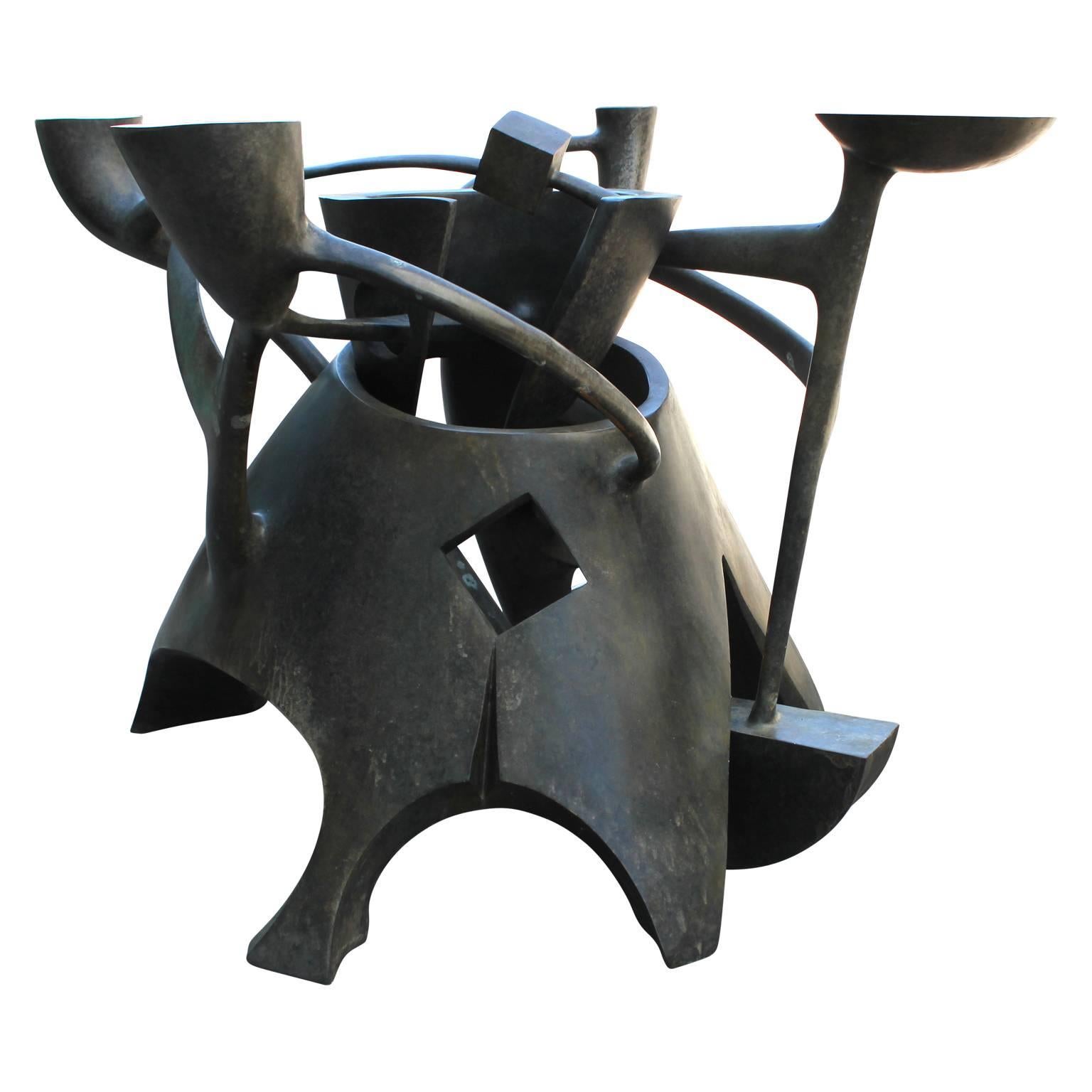 Sculptural bronze dining table by artist Gil Bruvel titled 