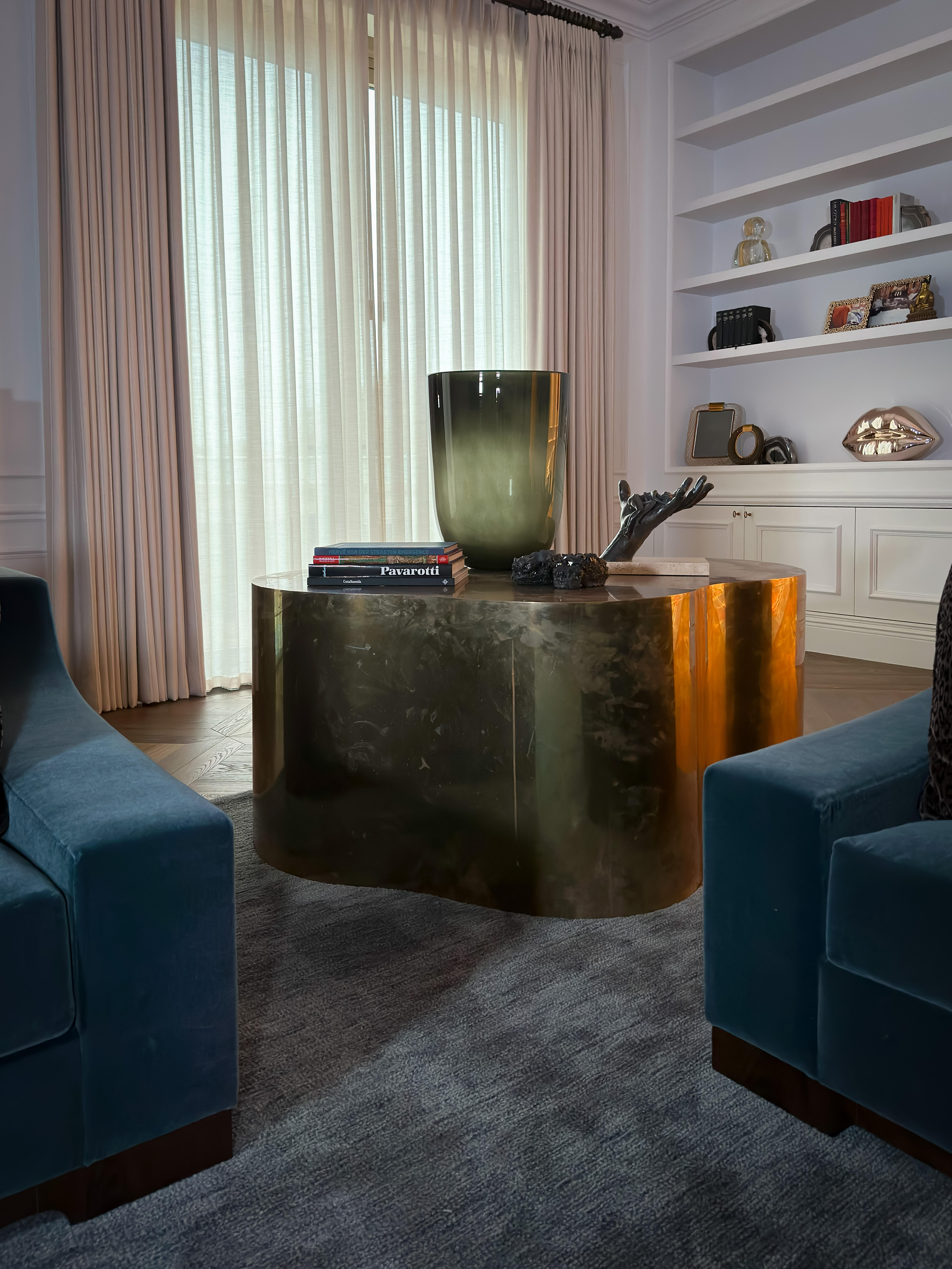 A striking example of late 20th-century American studio furniture, this sculptural freeform bronze side table evokes the distinctive aesthetics of the iconic designs by Karl Springer and Silas Seandel. Handcrafted circa 1980s, the piece is