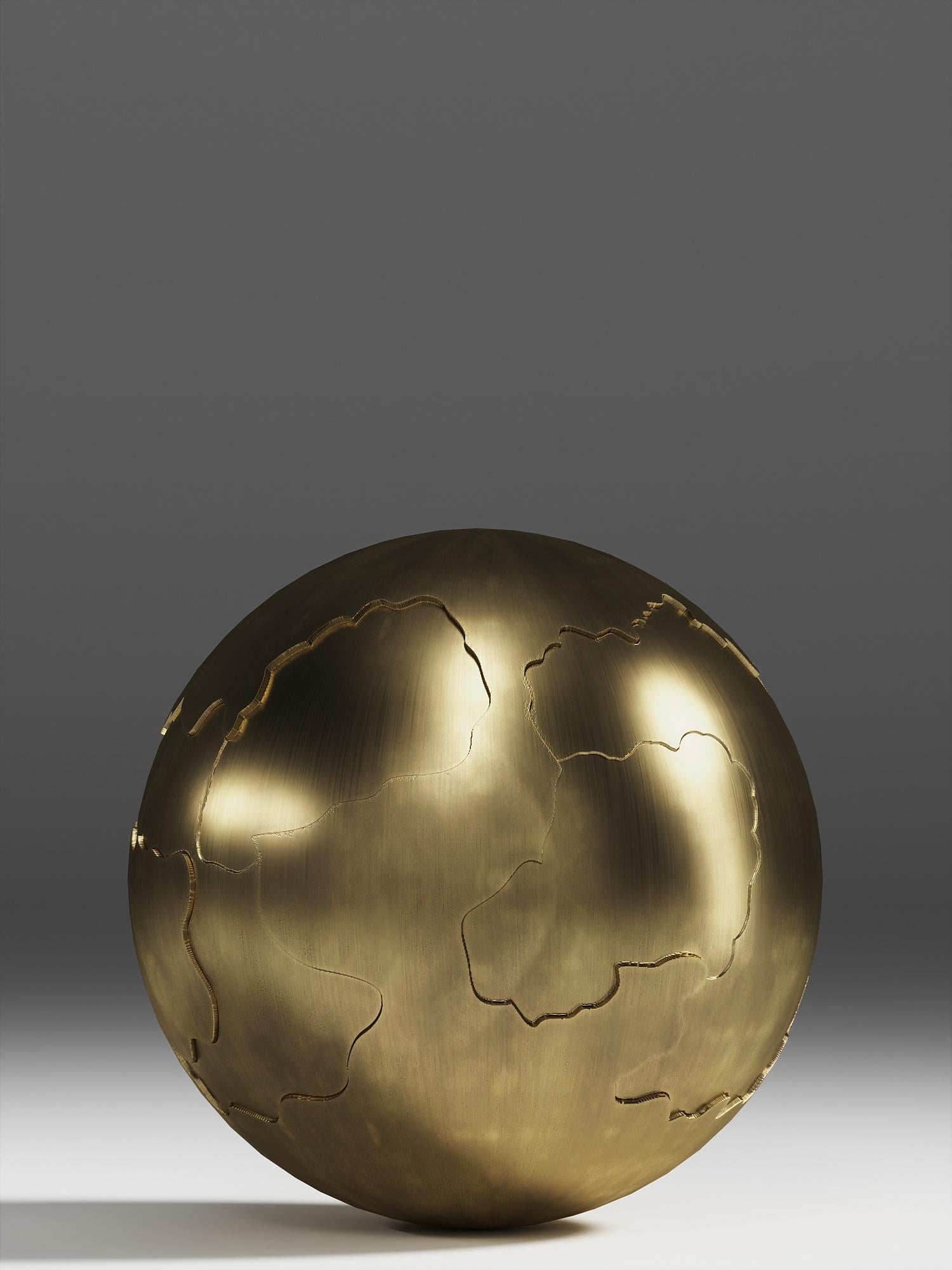 Patrick Coard Paris launches a unique and beautiful sculptural object collection. The set of 4 spheres are done completely in bronze-patina brass with subtle hand carved indentations to create a camouflage pattern. This listing is for the set of 4,