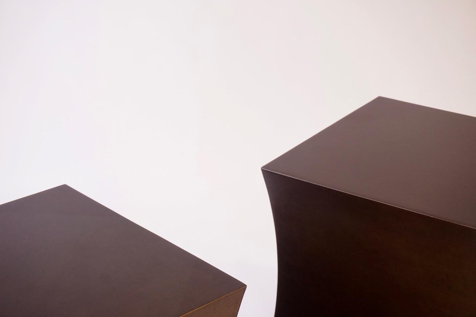 The Lehrecke studio began making some of their Classic pedestals and stools in different metals in 2000. The fabrication of the bronze pedestal is from a solid sheet material, expertly crafted with a brushed and stippled oxidized finish with a matte