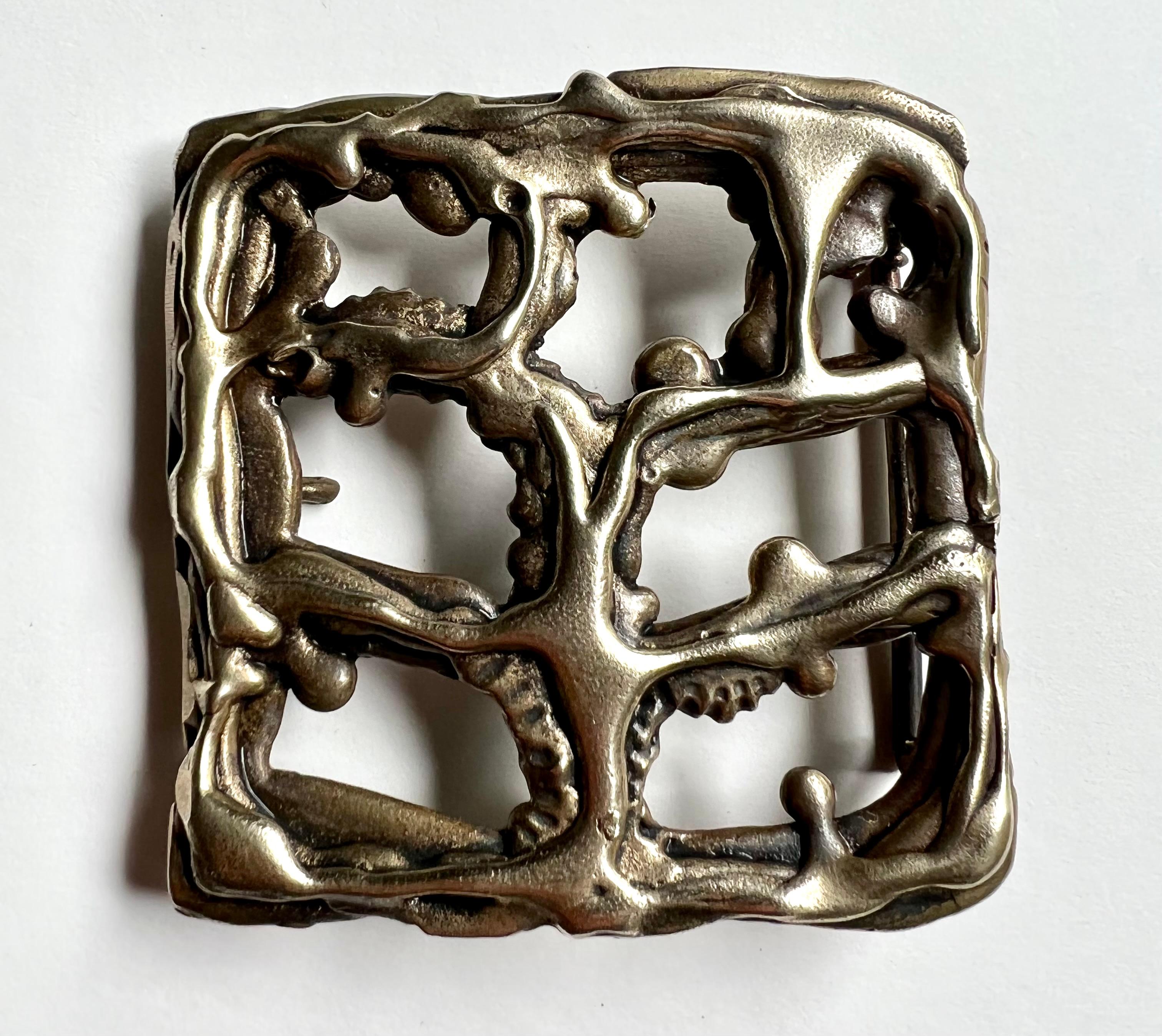 A very unique Brutalist brass belt buckle. Unique and one of a kind, this buckle will stand out and make a statement. In the Brutalist style, a wonderful compilation of interesting brass forms coming together. The piece is perfectly smooth and will