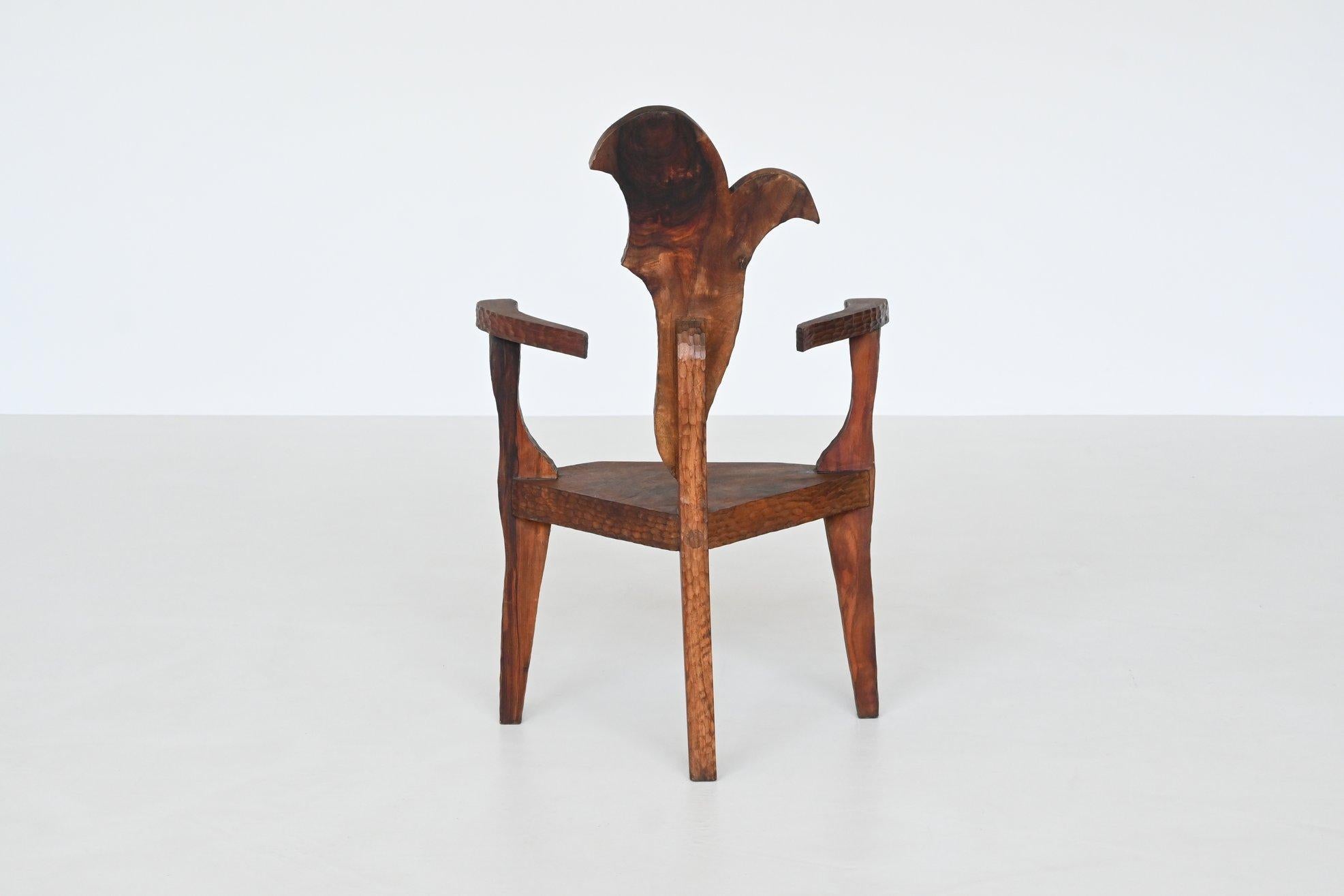 French Sculptural brutalist armchair handcrafted solid hardwood France 1970 For Sale