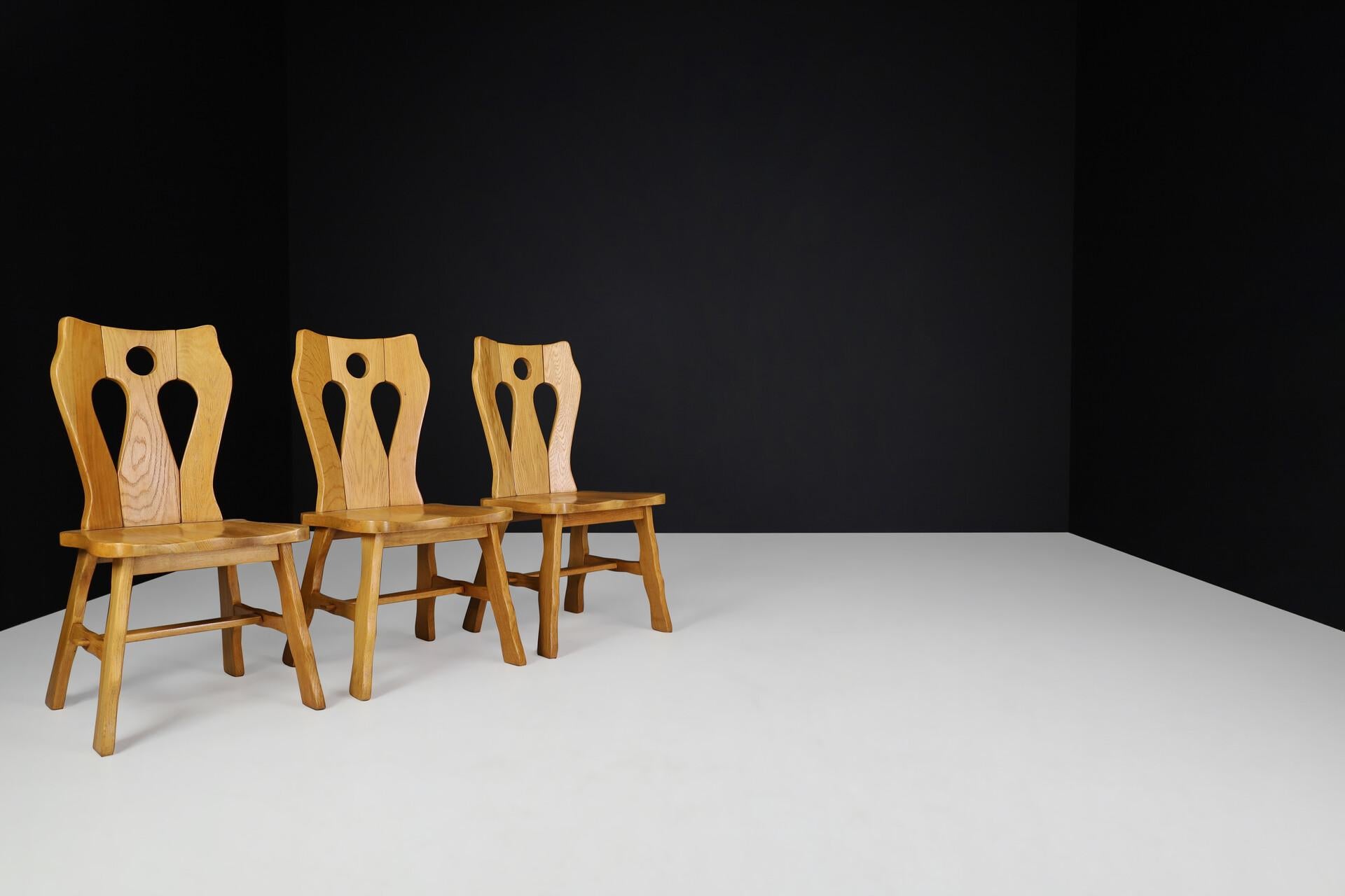 Chaises de salle à manger sculpturales en chêne blond brutaliste, Belgique, années 1970 - Lot de 4 Bon état - En vente à Almelo, NL