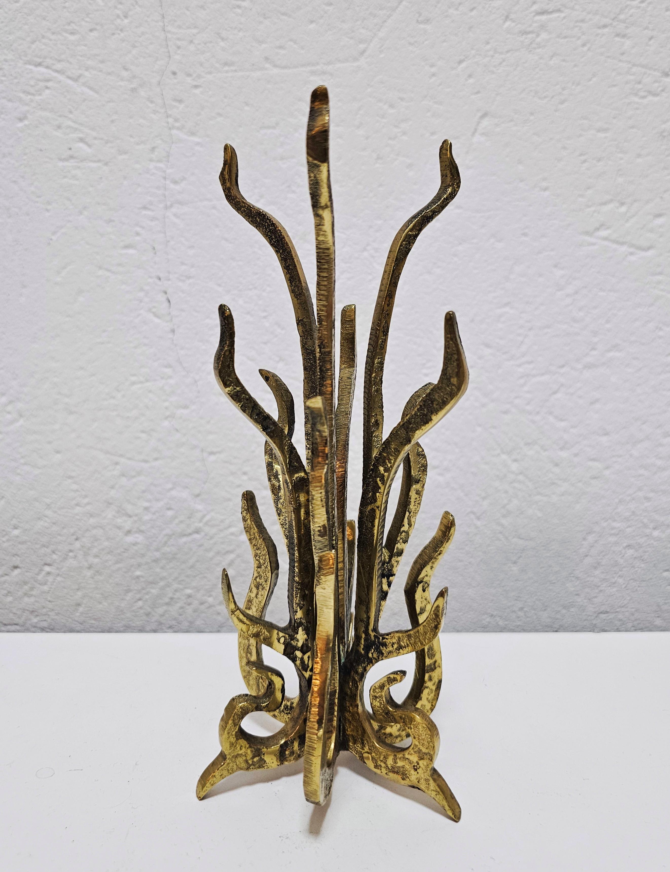 In this listing you will find an extremely rare and absolutely extraordinary sculptural Brutalist candle holder done in gilt bronze, shaped as a coral. It was designed by Austrian designer Heinz Goll, who's work is often found at auctions in some of