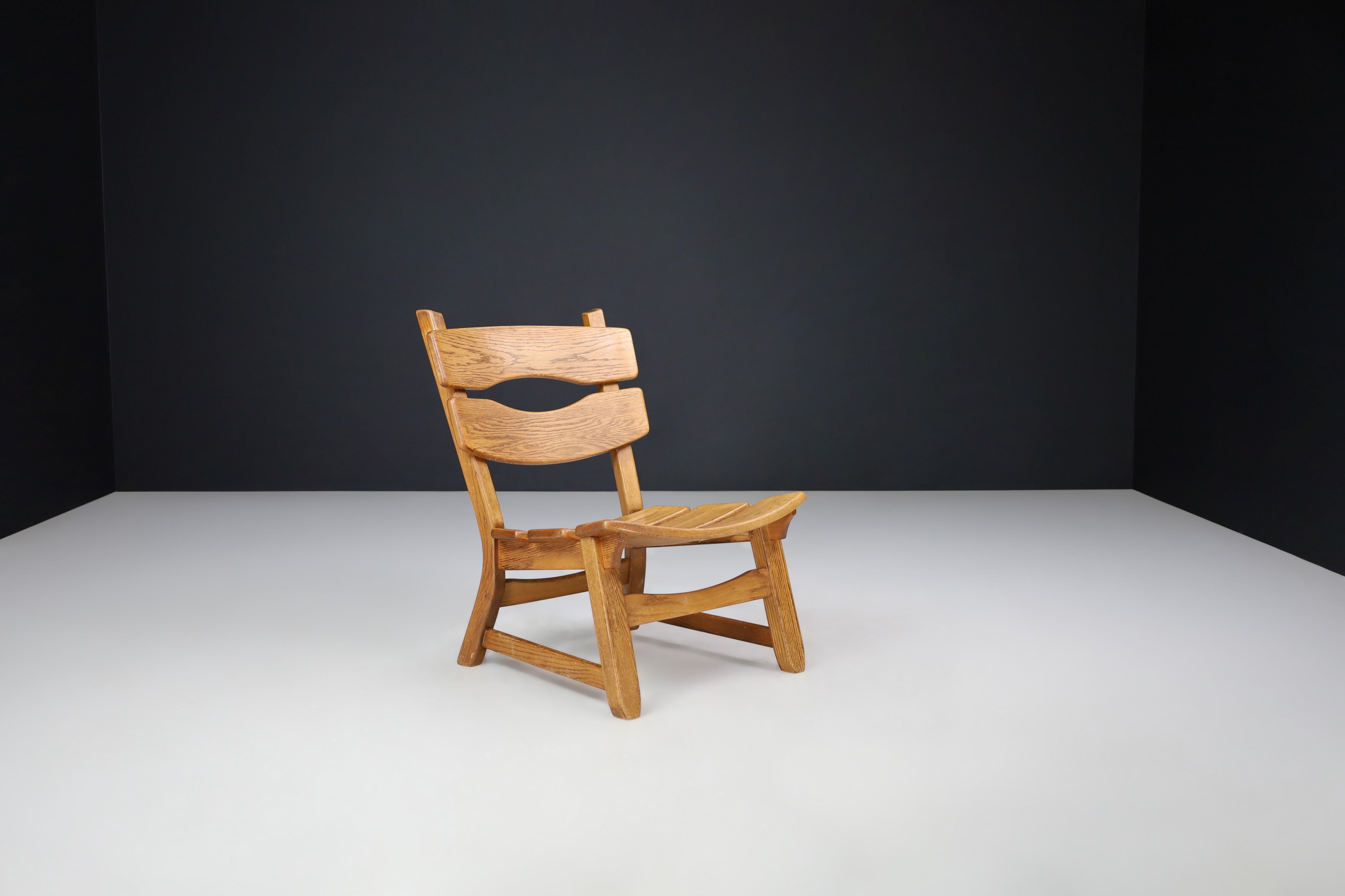French Sculptural Brutalist Lounge Chair in Blond Oak, France, 1960s For Sale