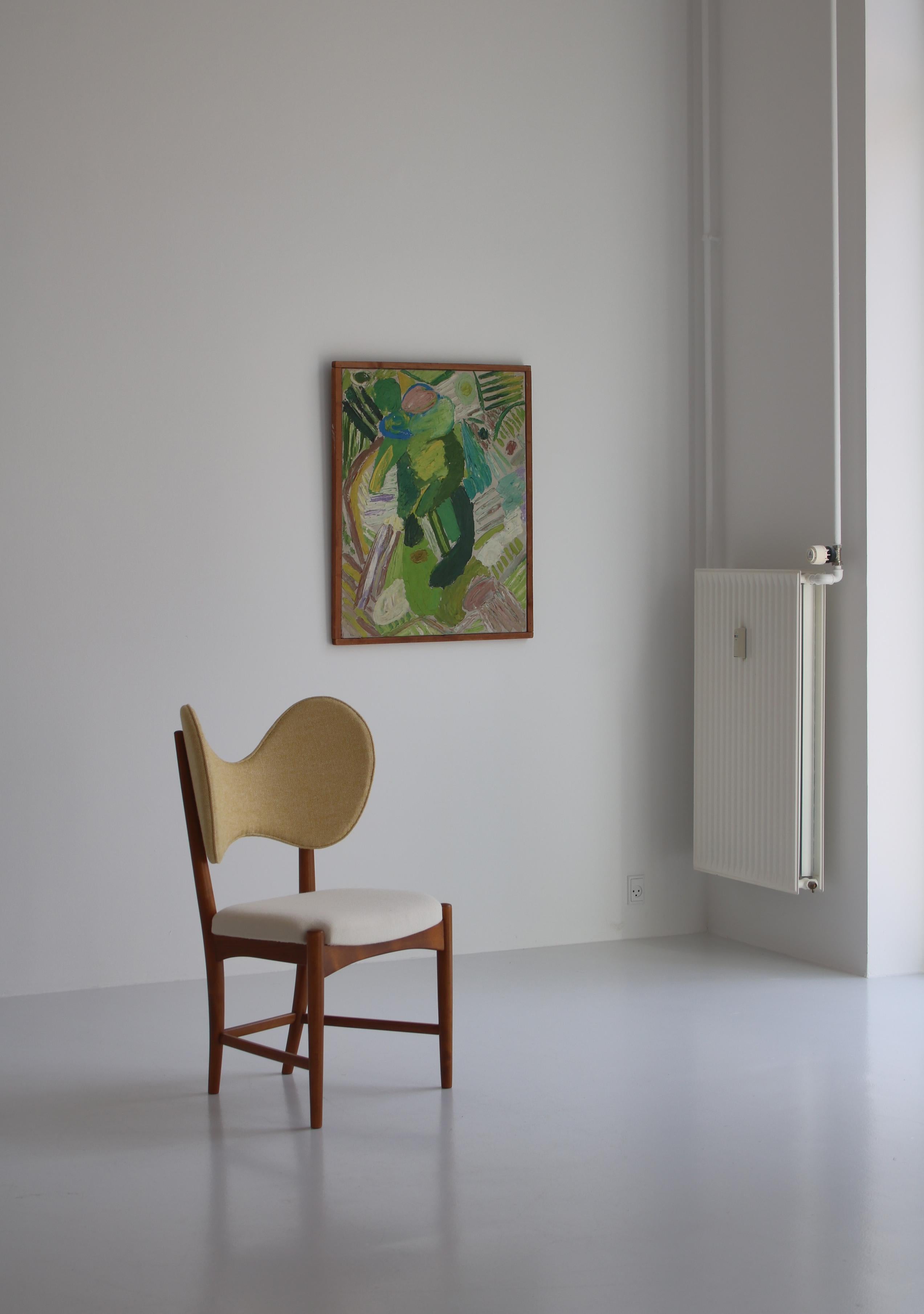 Wunderschöner und sehr seltener dänischer Designstuhl aus den frühen 1950er Jahren von den Designern Eva & Nils Koppel. Hergestellt und produziert in Dänemark von 