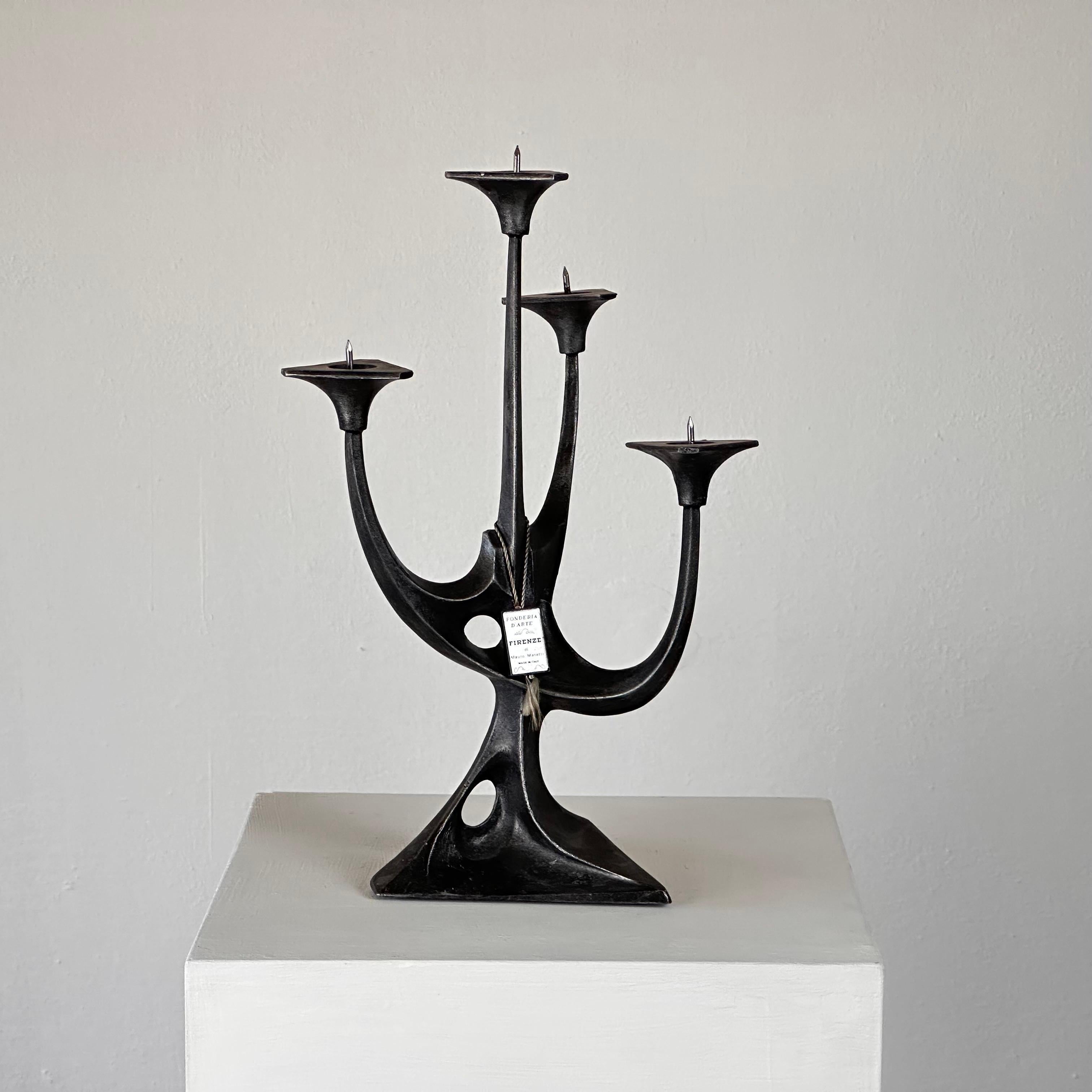Elevate your space with this stunning Sculptural Candelabra, a true gem crafted by the renowned Mauro Manetti for Fonderia d'Arte Firenze in the 1960s. Immerse yourself in the allure of Italian mid-century design with this exceptional piece that