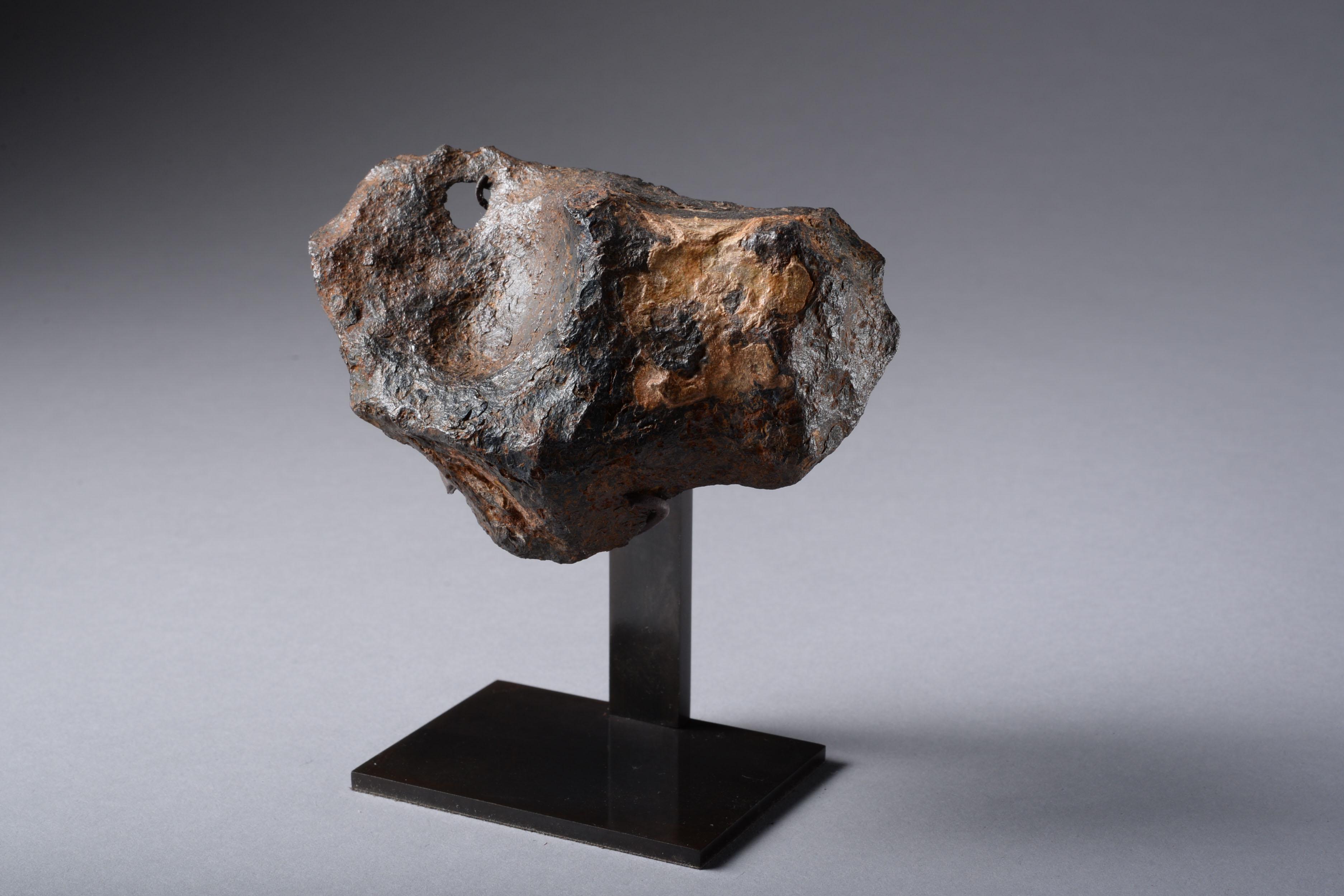 A sculptural iron octahedrite meteorite from the famous Barringer crater, Coconino County, Arizona. A beautiful fragment dating to the formation of our solar system, around 4.57 billion years ago.

Around 50,000 years ago, a 160-foot-wide piece of