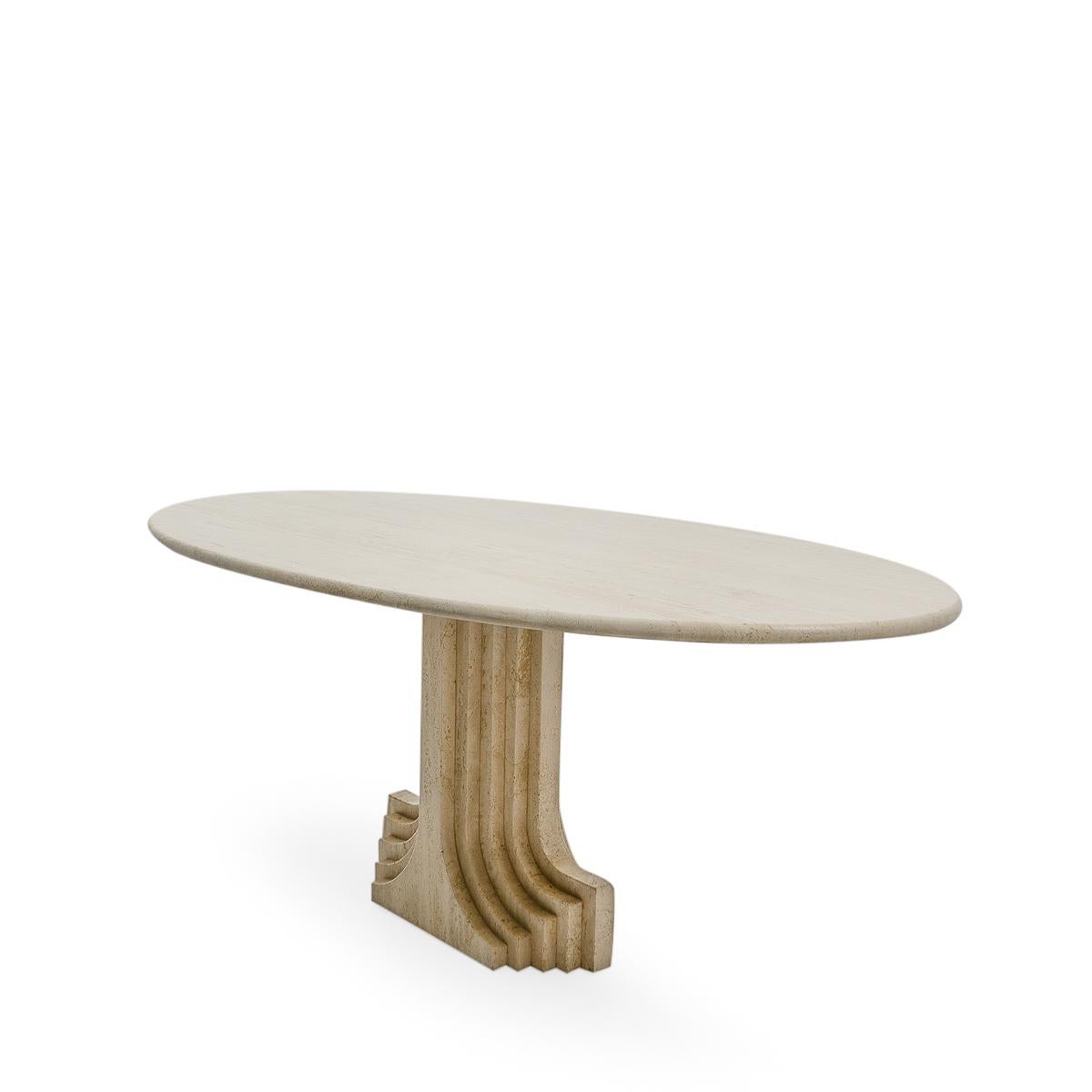 Oval travertine dining table by the Italian Architect Carlo Scarpa, designed during the 1970s.

With its sculptural pedestal base and polished travertine table top this piece is Scarpa’s modern take on Classic architecture. A striking centrepiece