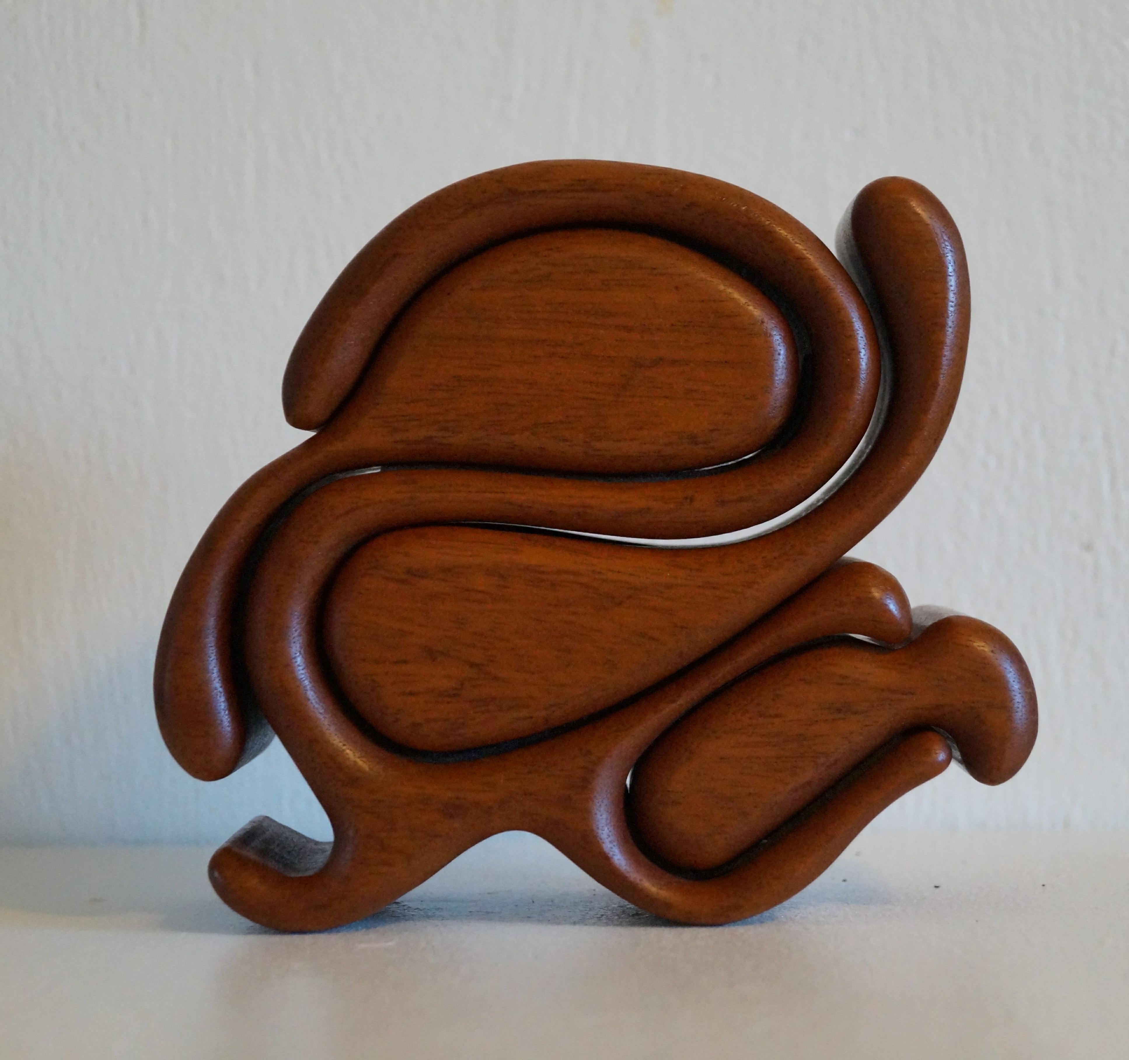 Sculptural Carved Teak Scandinavian Modern Wood Puzzle Box Richard Rothbard . Hidden 3 compartments with insert protectors for jewelry , small storage pieces , etc .  The mini pieces slide out and have protective pieces on the main piece , to