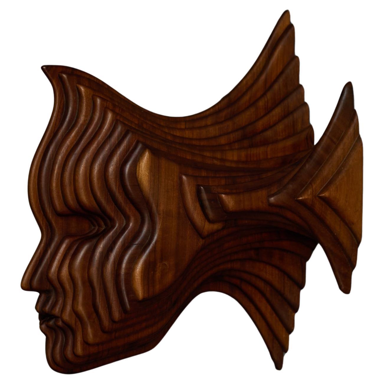 Panneau mural sculptural en forme de masque en bois sculpté, France, années 1970