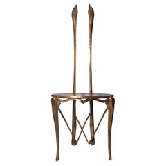 Sedia scultorea in bronzo fuso IGNIS OSSIUM, patina personalizzabile - oro marroncino