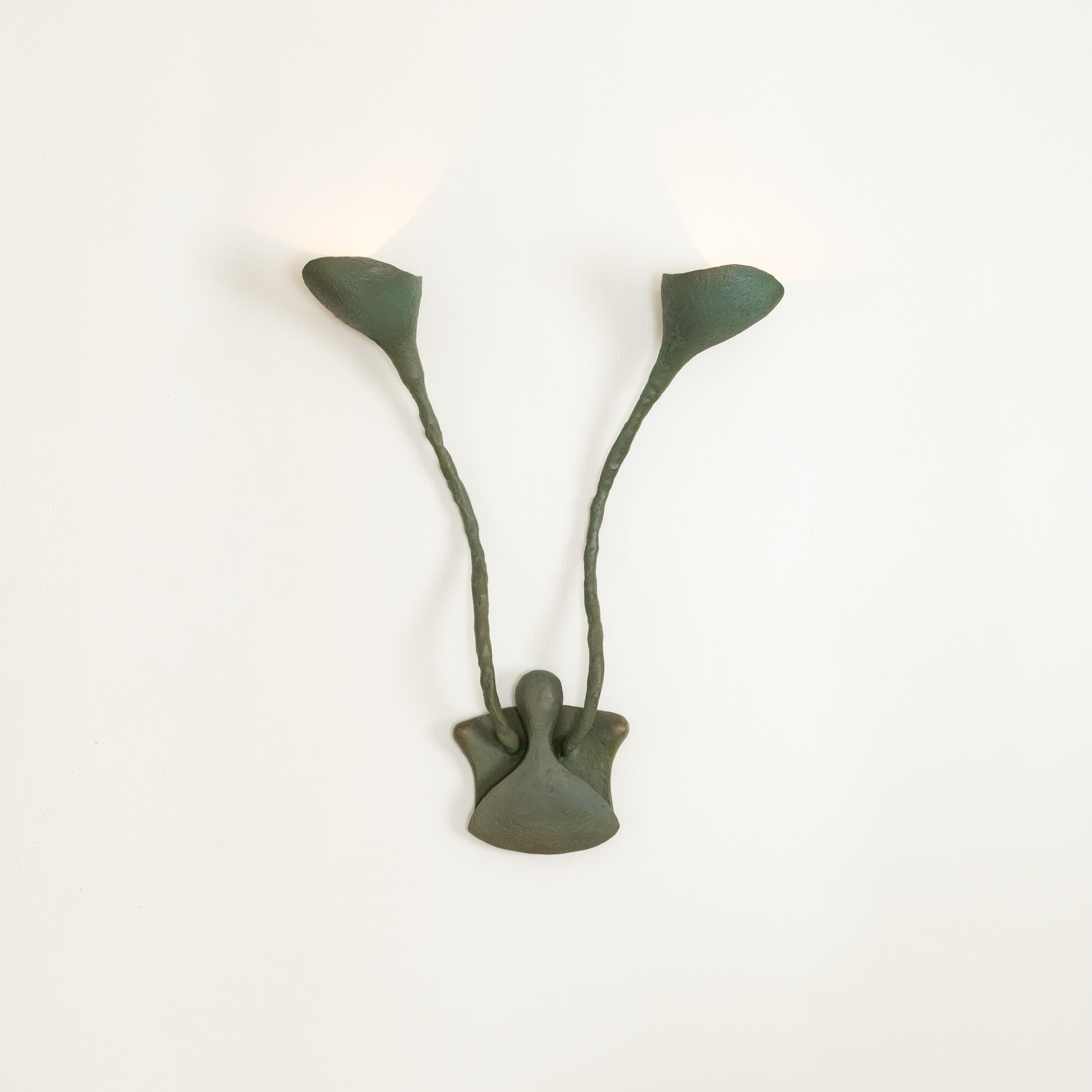 Sculptural bronze two-arm wall sconce entitled 