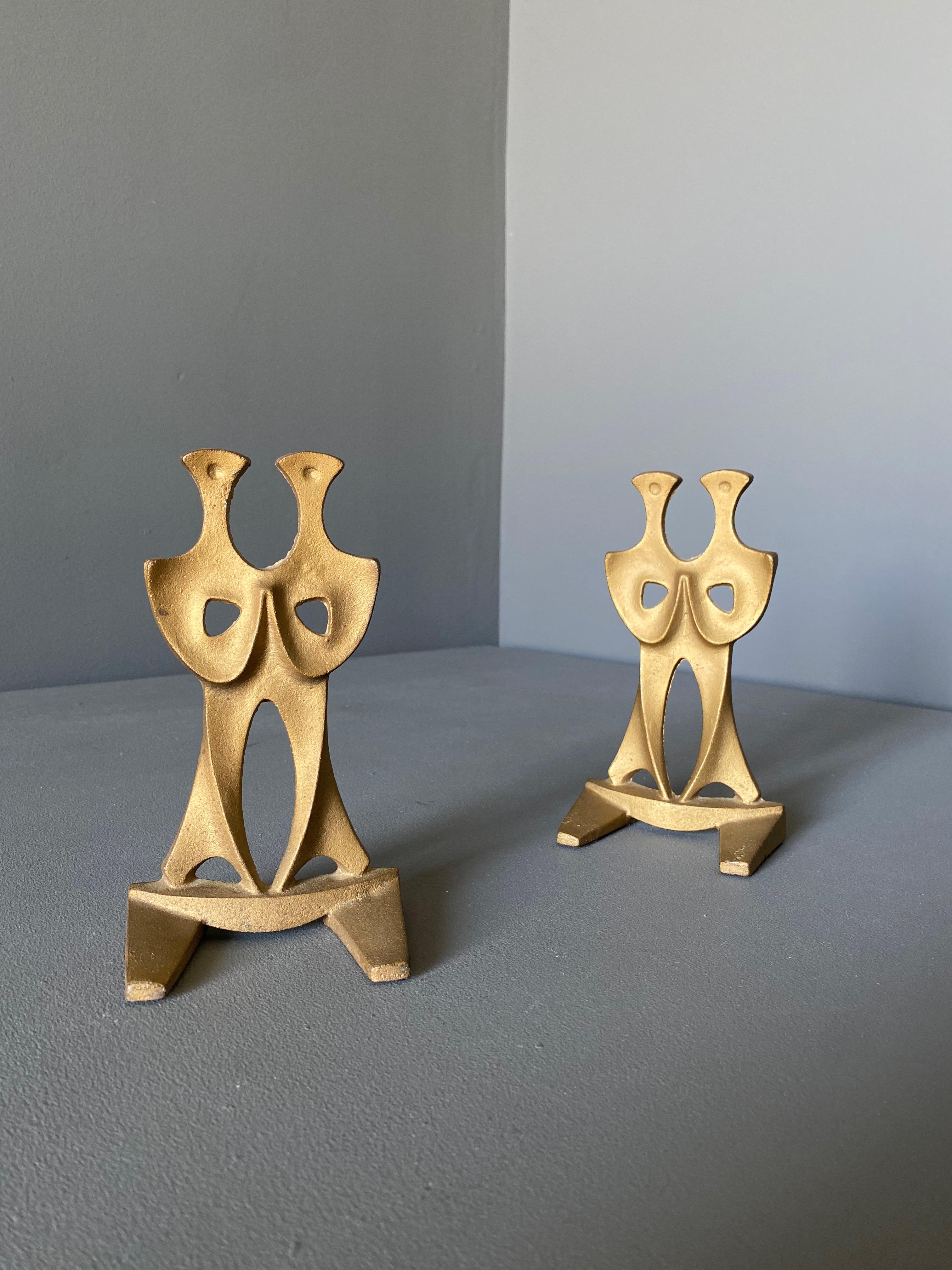 Sculptural cast iron bookends in the manner of Frederick Weinberg, circa 1955.