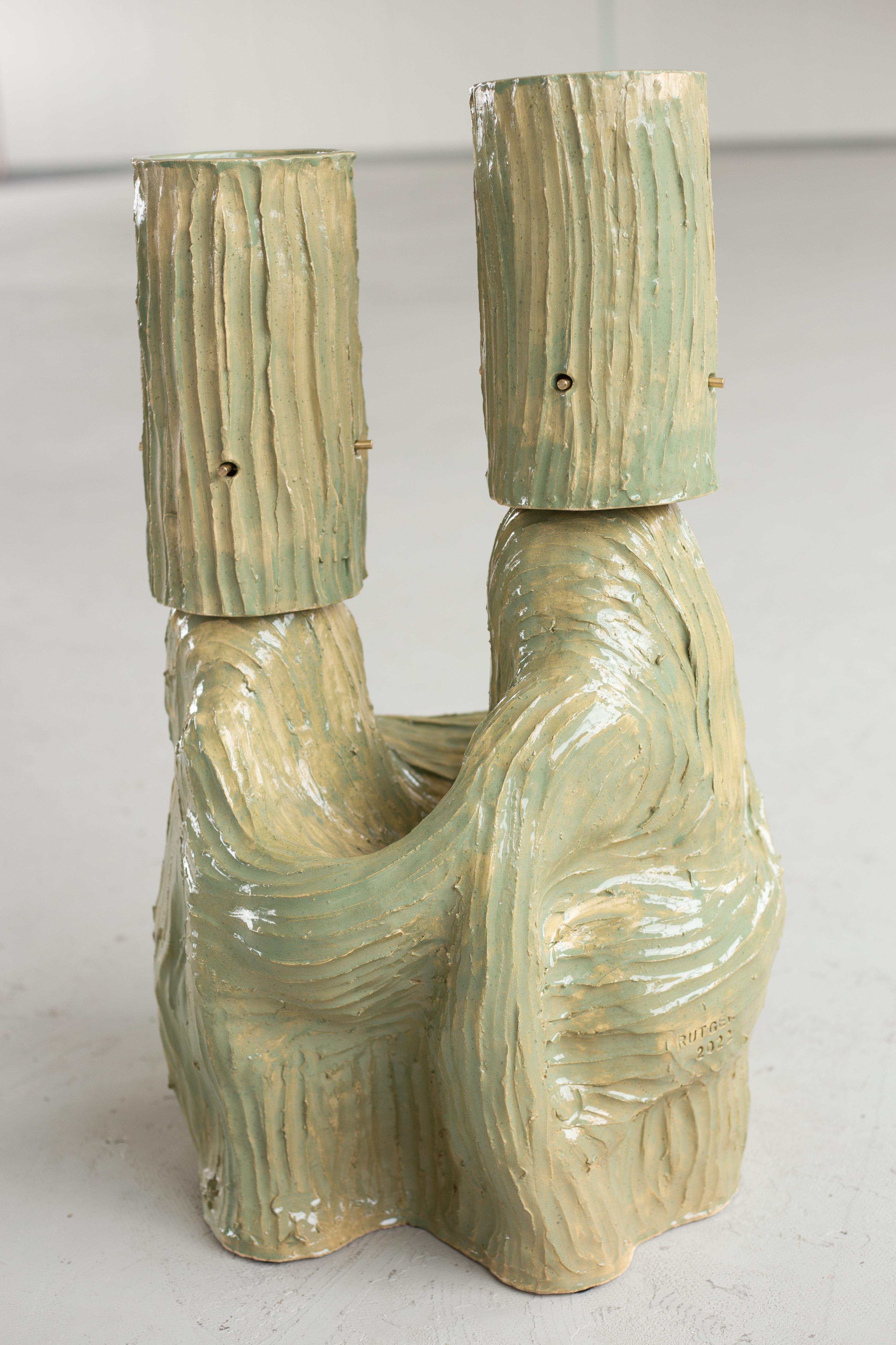 Sculptural earthenware table light resembling embracing characters

The piece is a one-off and signed by the artist.

