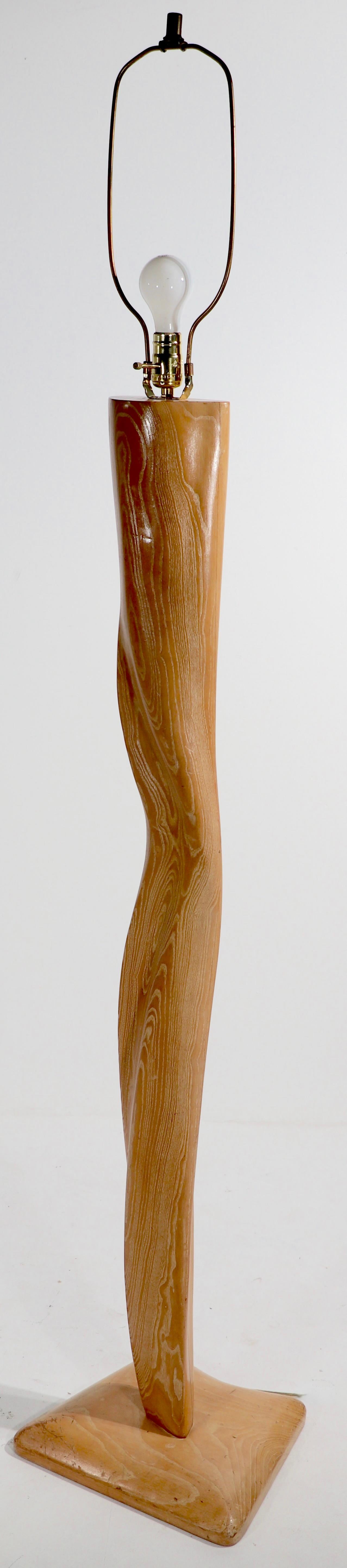 Sculptural organic wood floor lamp by Yashia Heifetz, in original cerused oak finish. This example has been rewired, the socket, and harp are not original. The lamp is in very good condition, showing only light cosmetic wear, normal and consistent