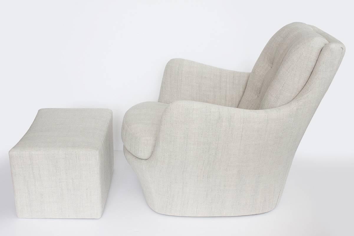 Great sculptural chair and ottoman by Milo Baughman for Thayer Coggin. Great lines. Perfect scale. Newly upholstered in soft grey linen with new foam. Ottoman has hidden casters. Excellent condition.