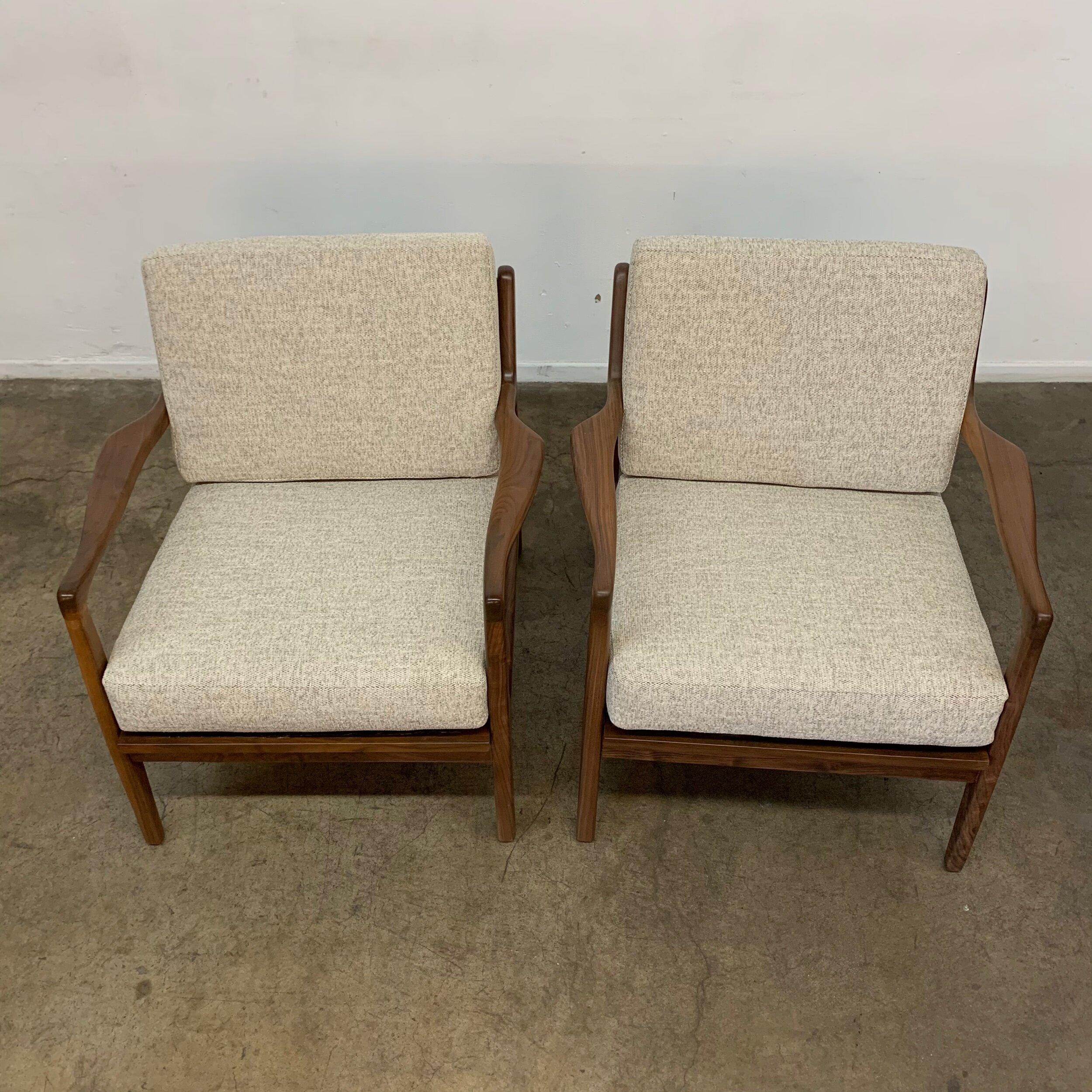 SW22 SD19 SH18 AH5
Made in house using solid walnut wood . The walnut frame has organic walnut grain and tone. 
The chair pictured is available, we have four matching chairs with matching fabric available on floor. (Please note- stock varies and