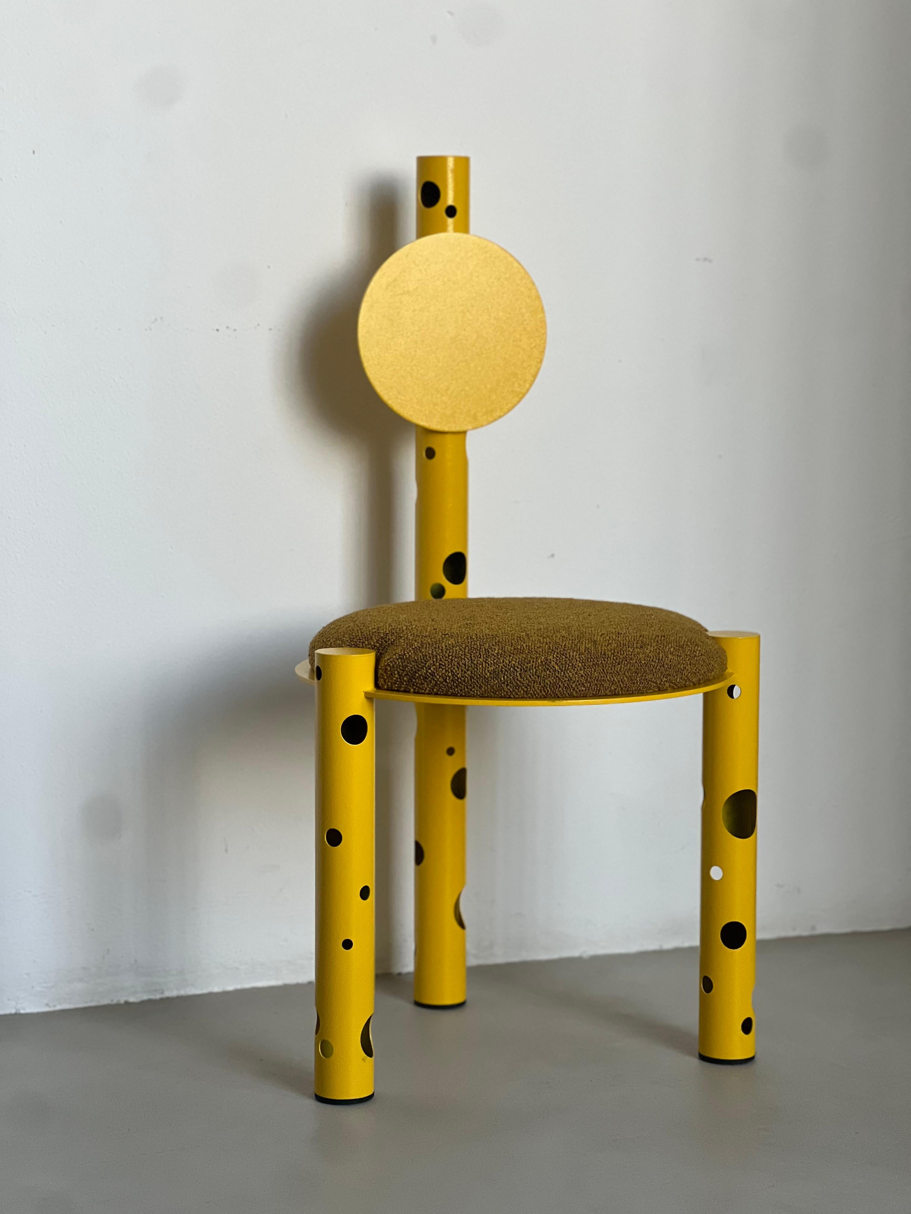 Sculptural dining chair - contemporary collectible chair - metal chair with holes - Entrance Chair

Designed and conceived in 2024 , this chair is the latest addition to Spinzi's Silös collection. Sculptural yet playful, finished in a bright shade