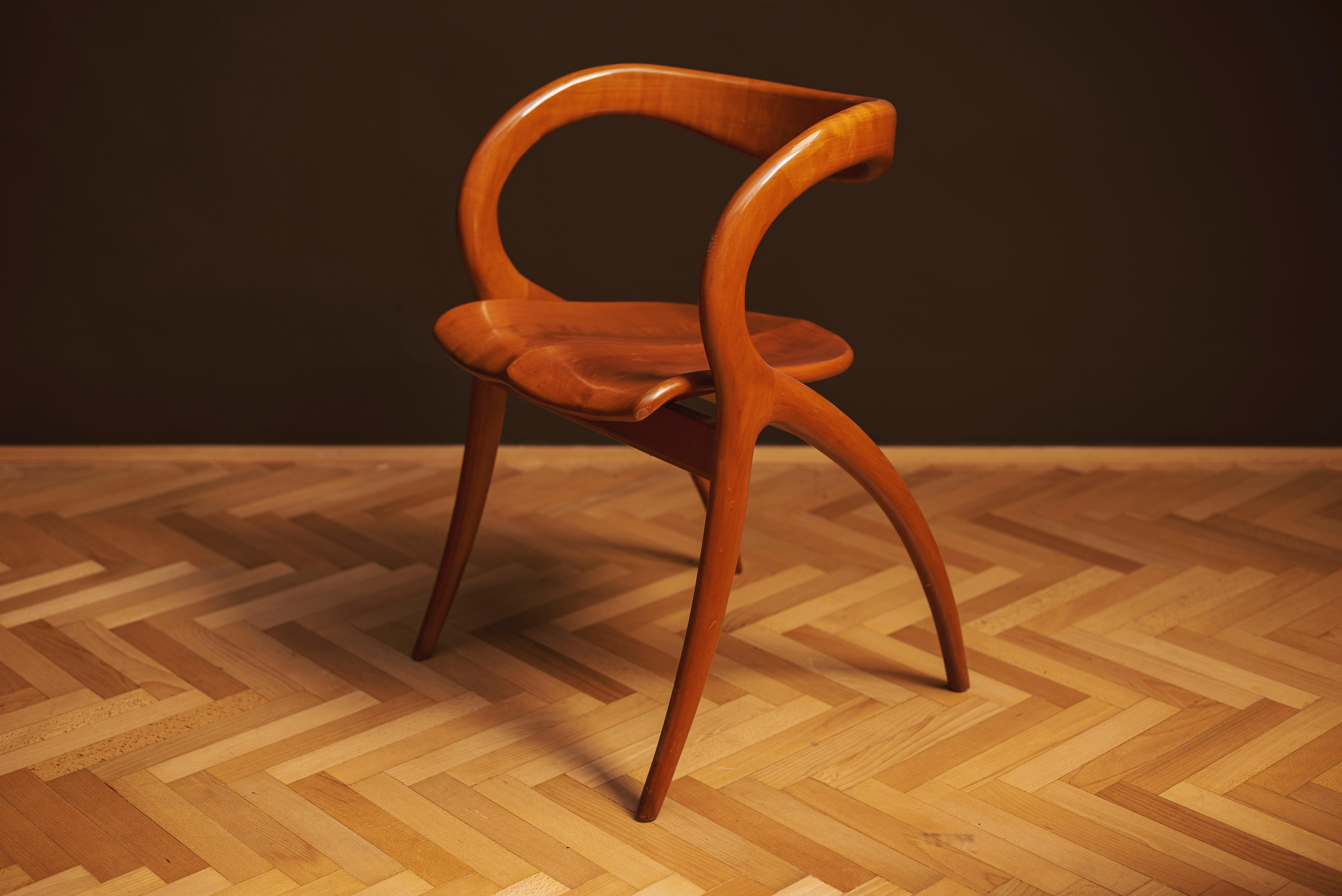 Striking sculptural armchair designed by A. Sibau in Italy during the 1960s. With its bold curves and distinctive silhouette, this piece embodies the expressive spirit of postmodern Italian design. A true statement chair that combines artistic form