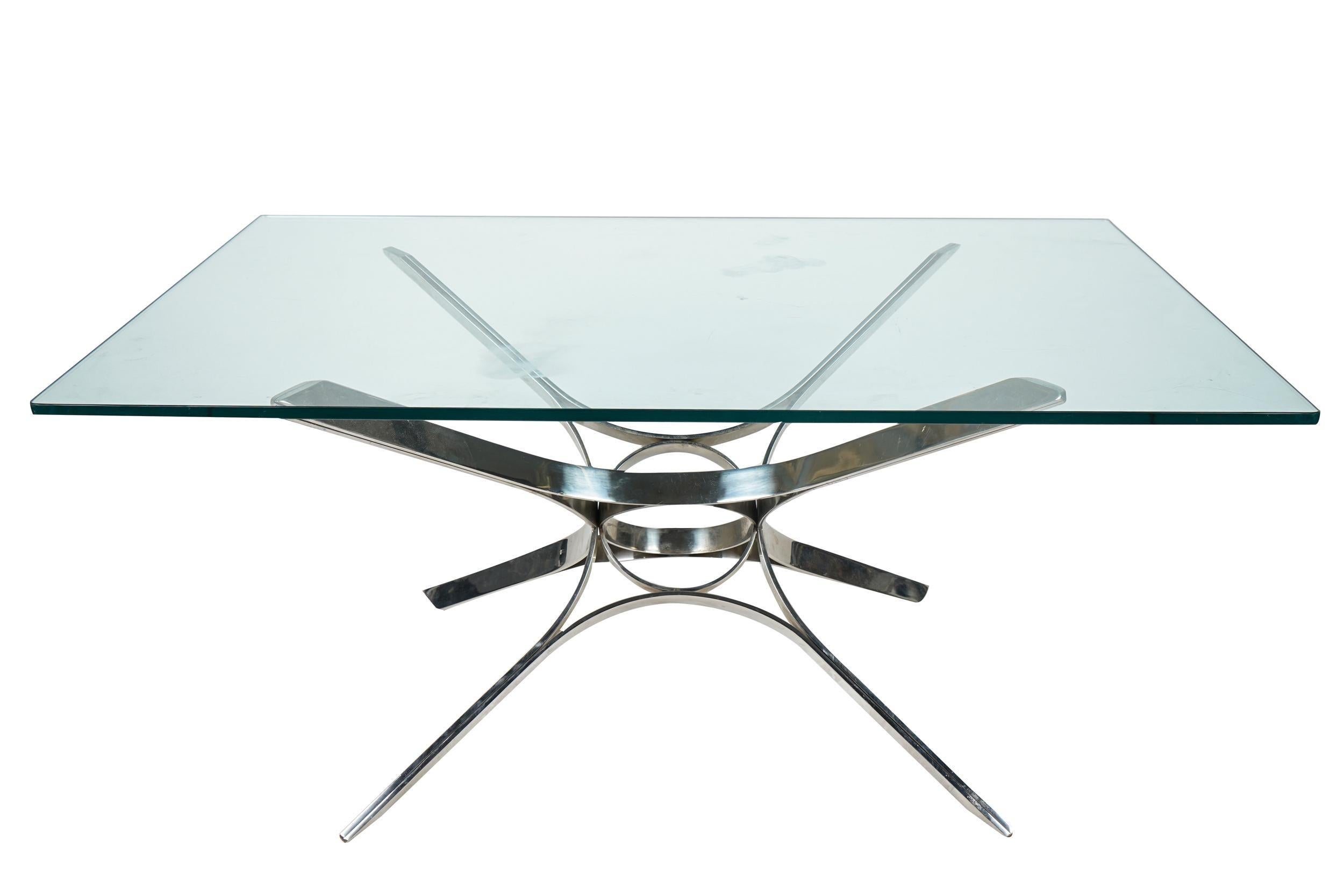 Sculptural chrome and glass coffee table designed by Roger Sprunger for Dunbar Furniture.
 