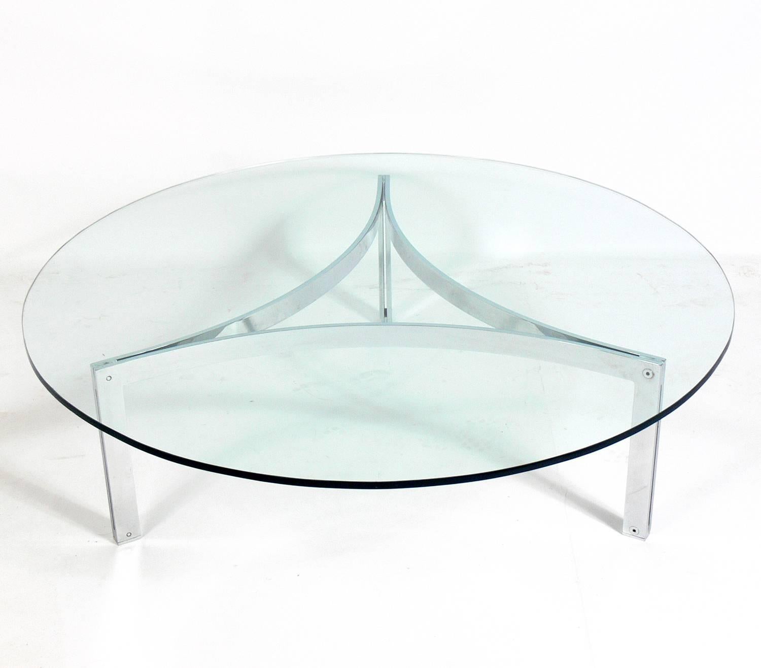 Table basse sculpturale chromée modèle 