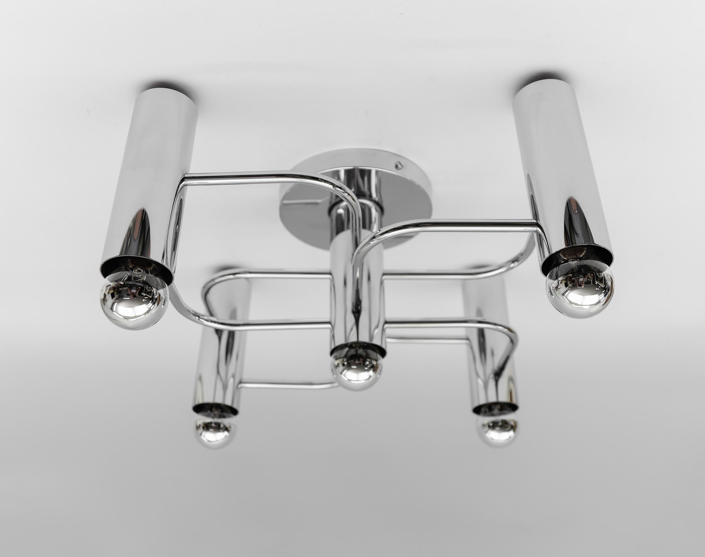 Sculptural Chrome Wall Light Flush Mount by Leola, 1970s Germany

The fixture need 5 x E14 standard bulbs with 60W max.

Light bulbs are not included.

It is possible to install this fixture in all countries (US, Australia, Asia, UK, Europe,..)