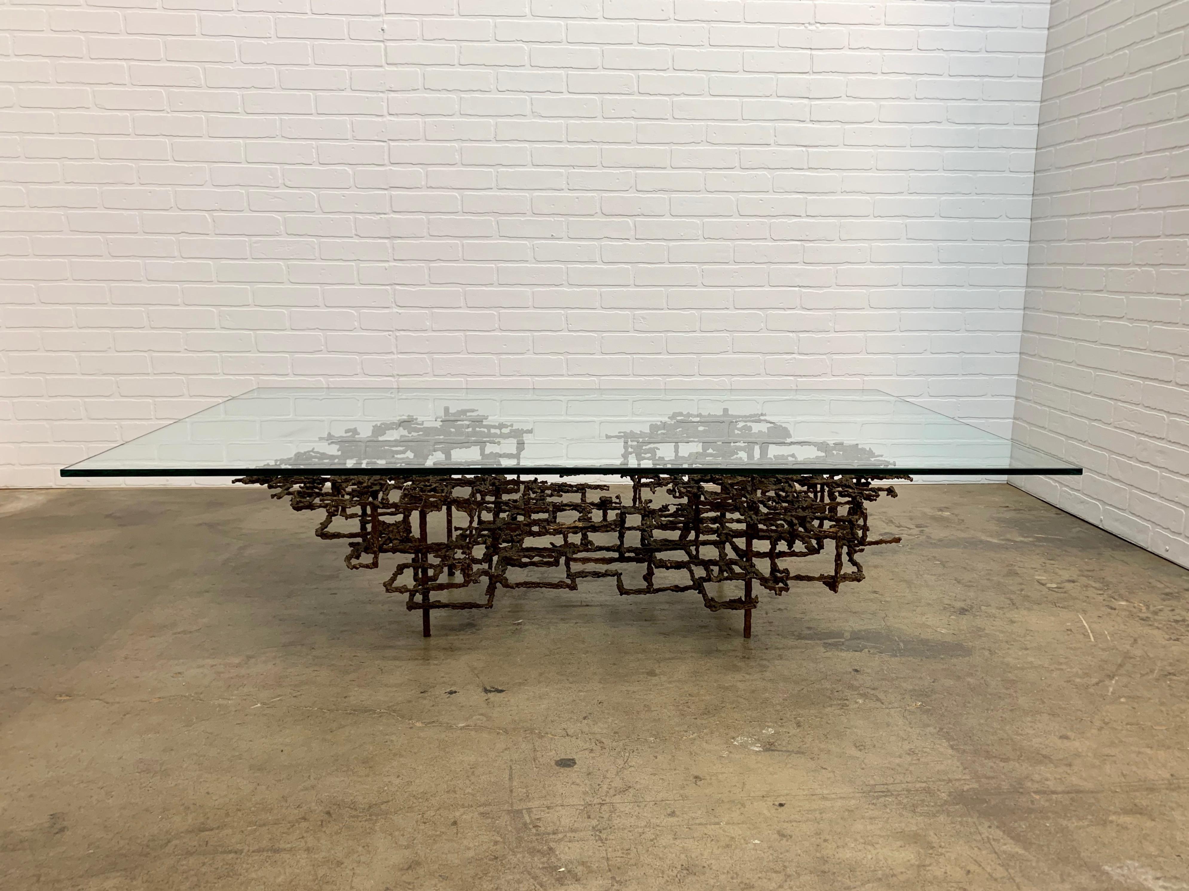 Sculptural Brutalist coffee table by Daniel Gluck. This piece is signed 
