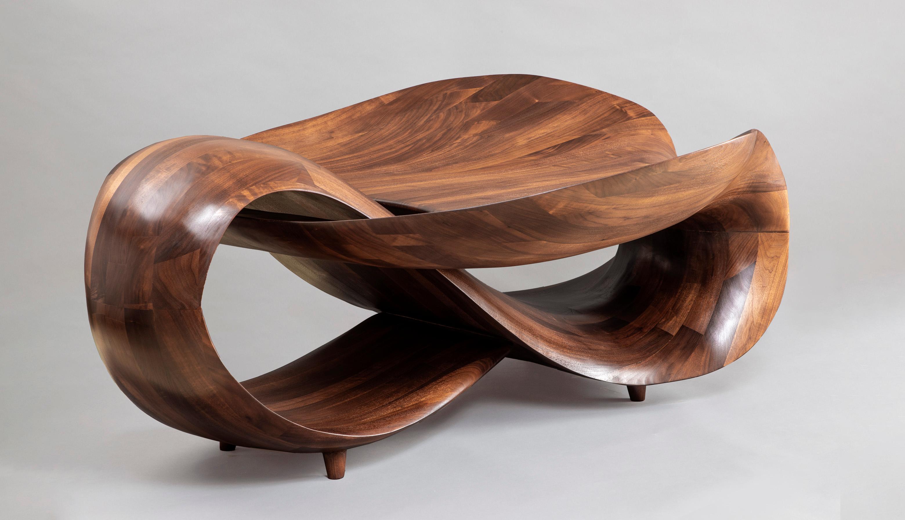 Sculptural coffee table by Gildas Berthelot
Exclusivity of Galerie Philia
Title: Quoi l’éternité ? 
Limited Edition of 3
Material: Solid black walnut
Dimensions: W 170 x D 120 x H 64 cm.


Gildas Berthelot has forged for more than 30 years a