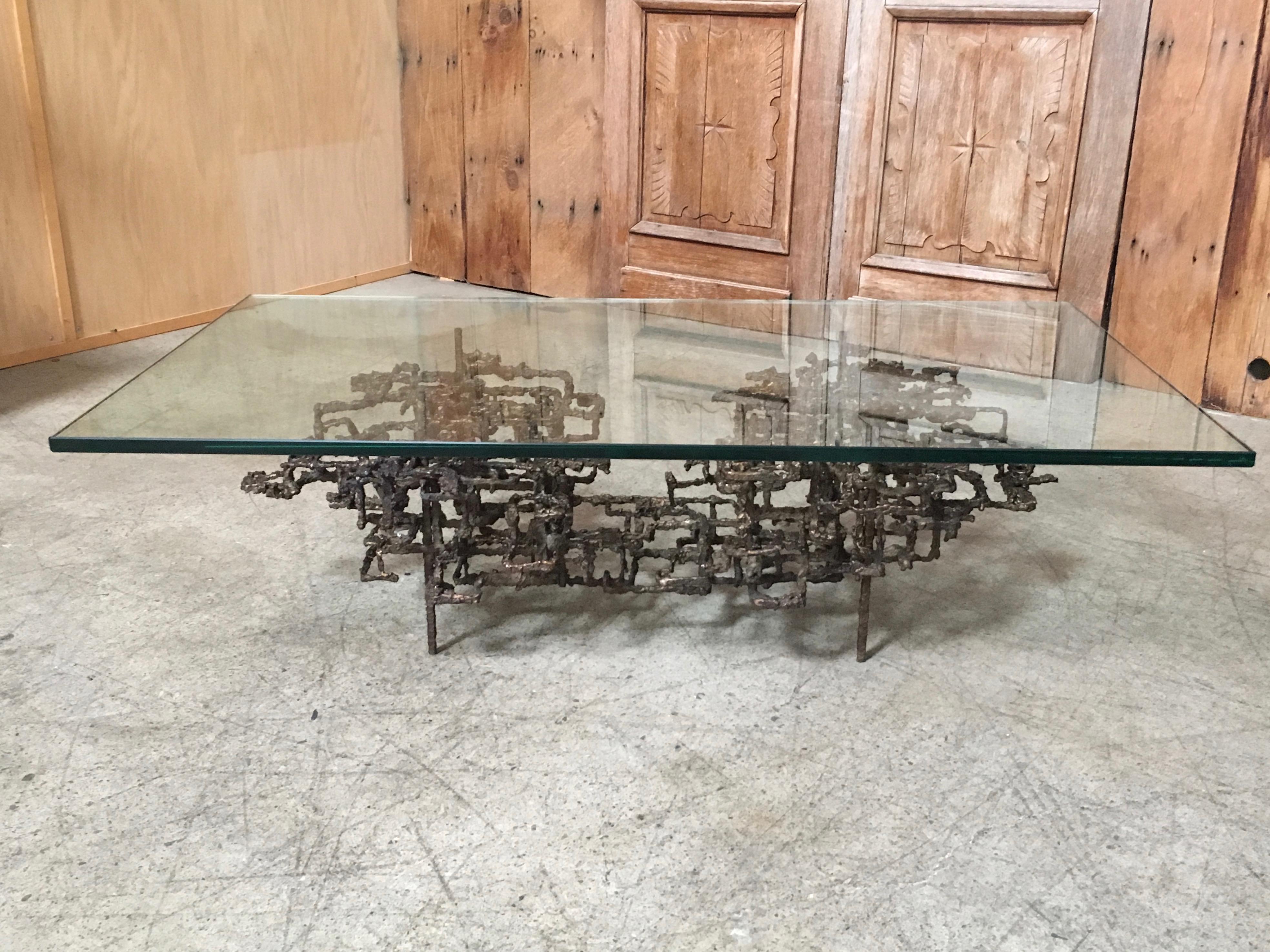 Sculptural bronze coffee table 

The base measures: 47