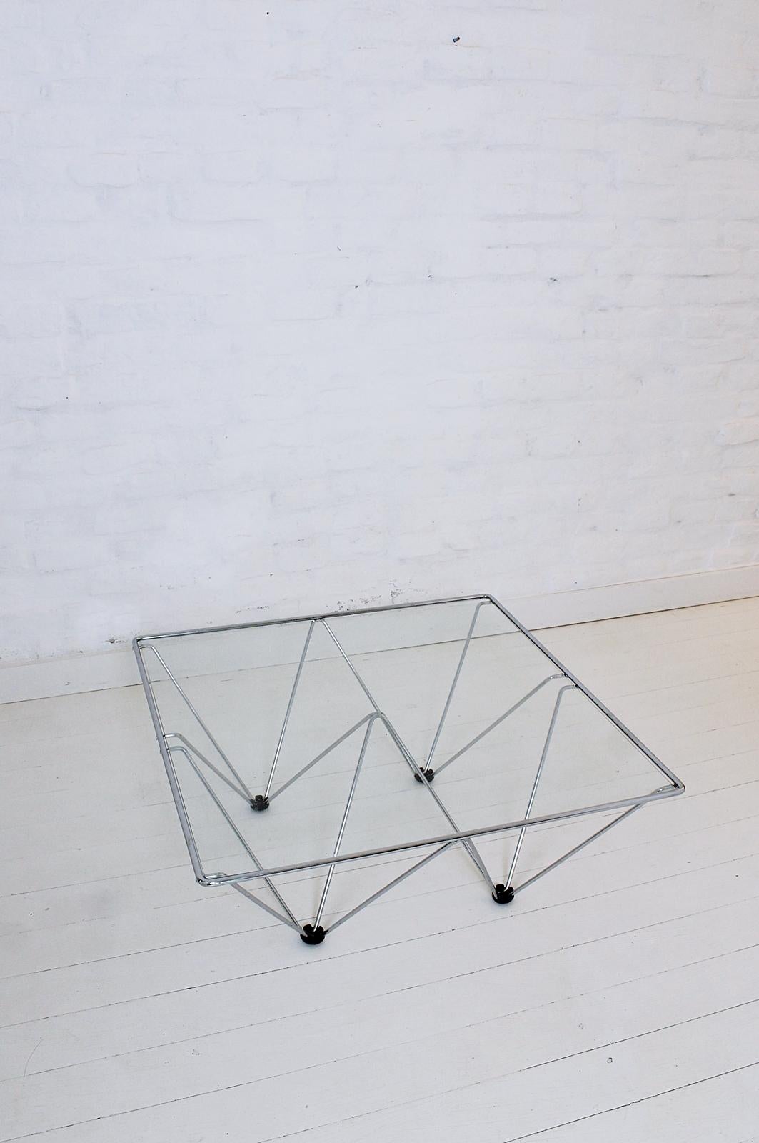 A beautiful and trendy coffee table in the style of Paolo Piva for B&B Italy, 1980s.
It could be used also as side table.
Made of chromed steel with a clear glass top. The glass is the original one.
Excellent vintage condition.
 