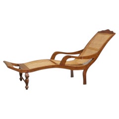 Sculptural Colonial Chaise Longue in Wood and Webbing Early 20th Century
