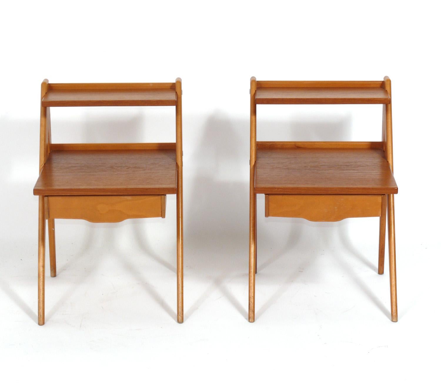 Sculptural Compass Leg Danish Modern night stands or end tables, designed by Yngve Ekström, Sweden circa 1960s. constructed of a beech wood frame with sculptural compass legs and contrasting teak tops. Each table has brass hardware and a shallow