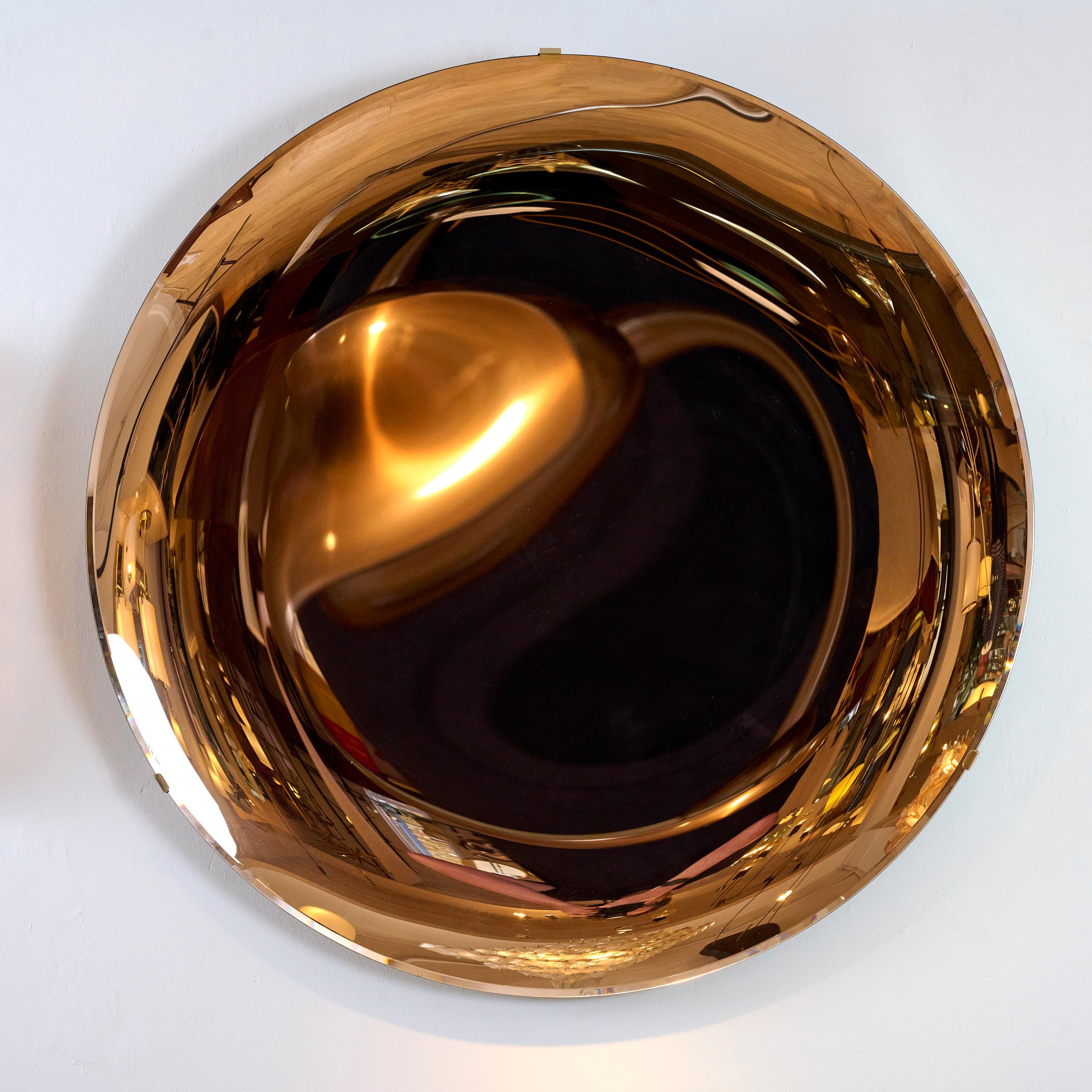 Brass Sculptural Concave Rose Gold Mirror For Sale