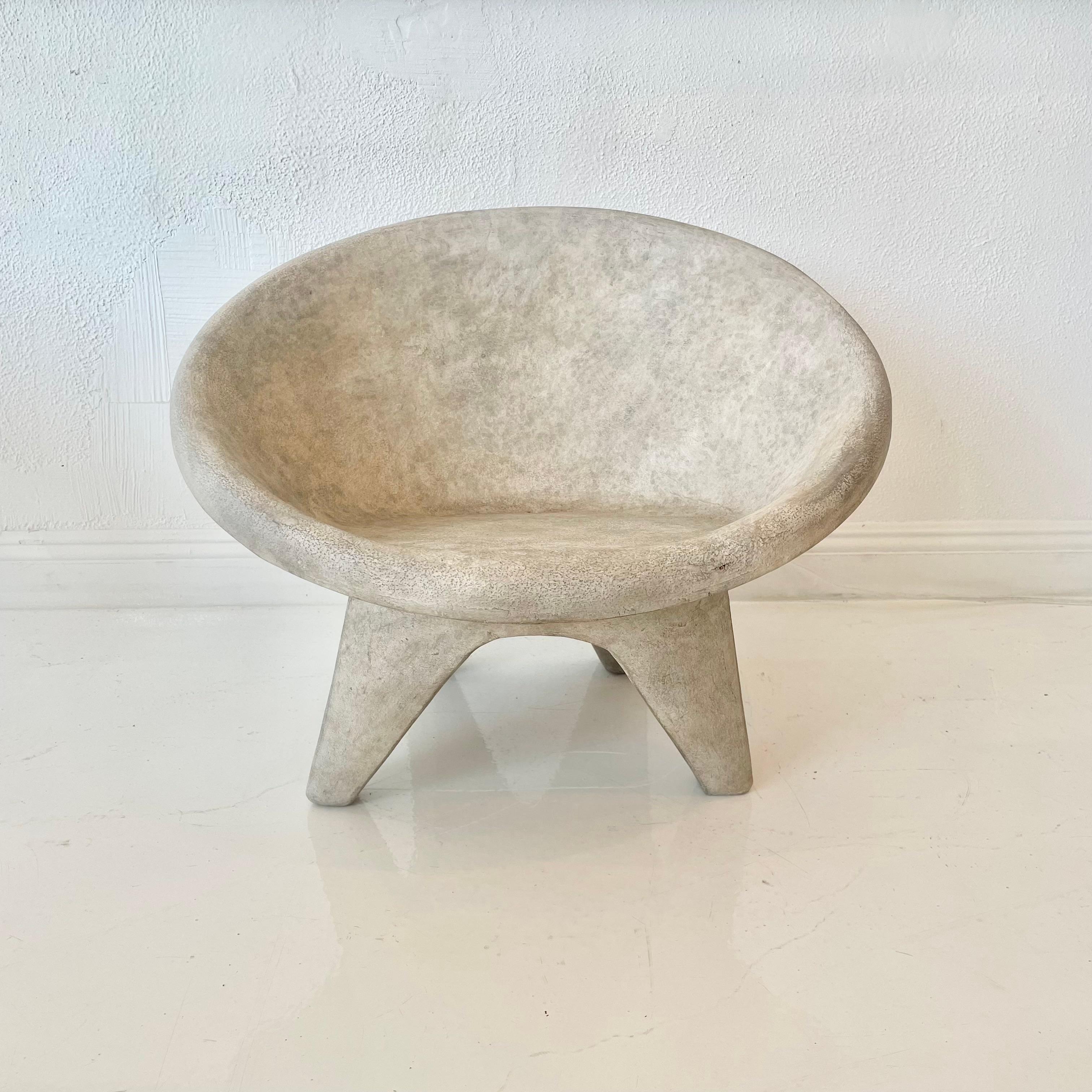 Fantastic outdoor chair made of solid concrete and each with a perfect and unique patina. Round saucer seat with angular legs. Incredible modern design perfect for any outdoor space. Factory drilled hole in the seat of each chair for water to drain.
